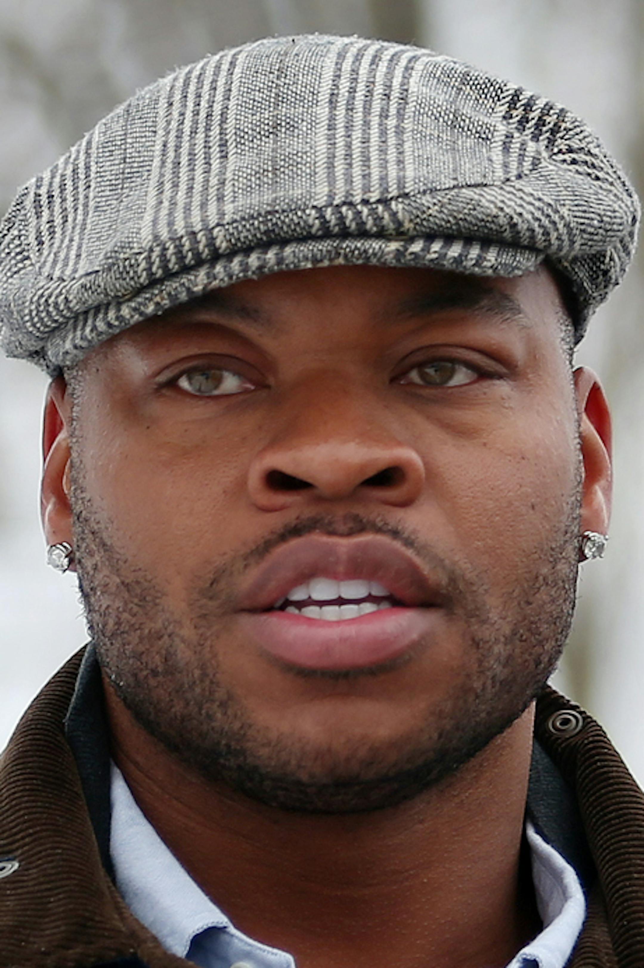 Former NBA basketball player Devean George talks to a group at the nothside lot that will house George's "Building Blocks" nonprofit that focuses on youth, education and family. ] JOELKOYAMAïjkoyama@startribune Minneapolis, MN on March 19, 2014. Former NBA basketball player Devean George, a northside native and graduate of nearby Augsburg College, has assembled $11 million-plus in financing for "The Commons," 45 rental apartments for working-class families atop retail shops in North Minneap