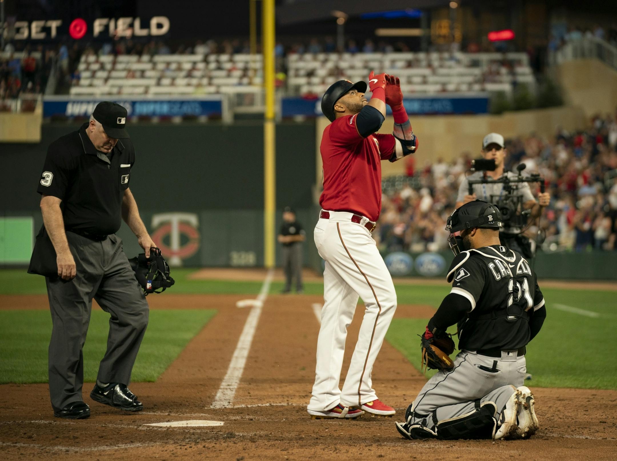 Minnesota Twins designated hitter Nelson Cruz celebrated after his solo homer in the fourth inning tied the score at 3-3.