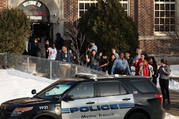 Students were evacuated from Patrick Henry High School after a gunman was reported getting off a Metro Transit bus near the school Tuesday.