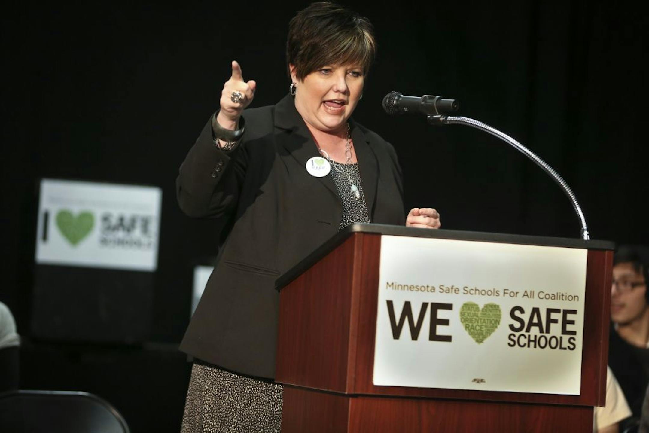 President of Education Minnesota Denise Specht chanted "We heart safe schools" during a press conference to support an anti-bullying bill called Safe Schools at Central High School in St. Paul, Minn., on Monday, December 9, 2013.