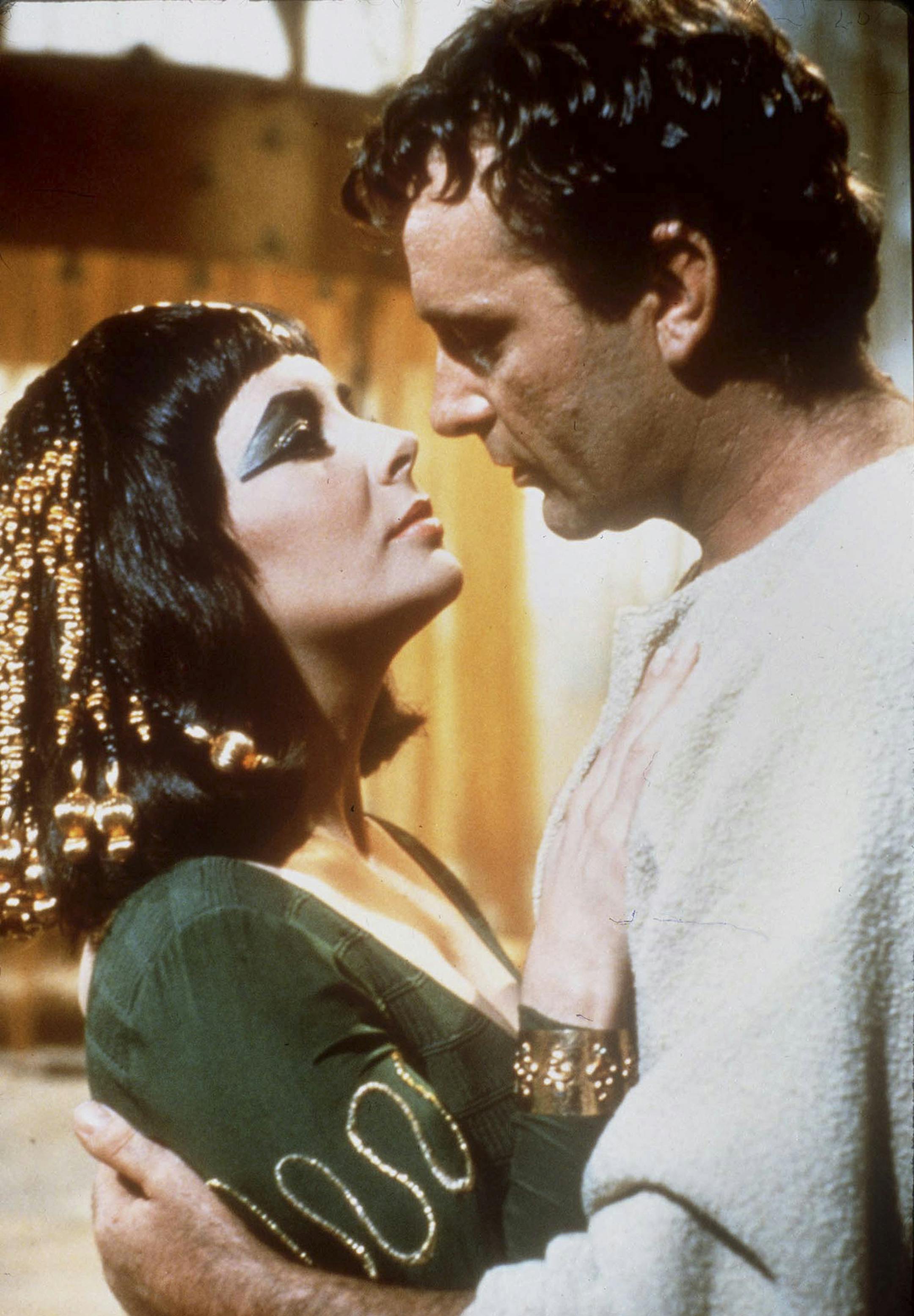 Elizabeth Taylor with Richard Burton in the 1963 film "Cleopatra," in an undated handout photo. ORG XMIT: MIN2013052015422960
