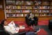 Sixth-graders Isaac Firkus, left, and James Dalbacka-Hoogenboom relax and read books in the school library at Franklin STEAM Middle School in Minneapo