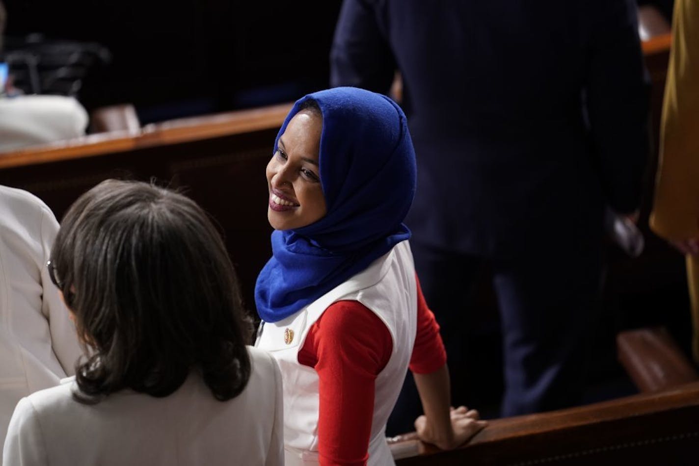 Rep. Ilhan Omar (D-Minn.) with fellow lawmakers ahead of President Donald Trump's State of the Union address, at the Capitol in Washington, Feb. 5, 2019.