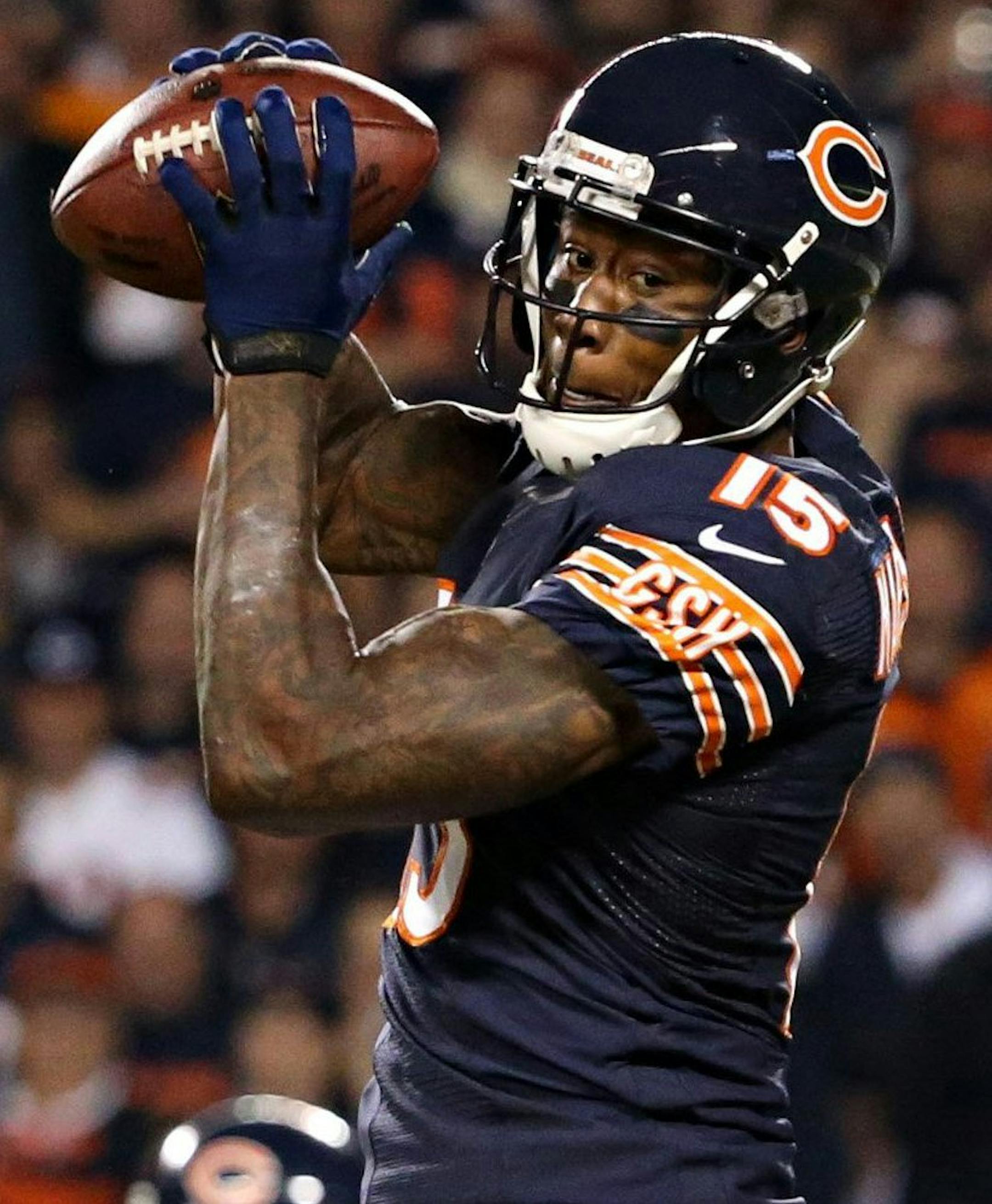 Chicago Bears wide receiver Brandon Marshall (15) catches a touchdown over New York Giants defensive back Will Hill (25) in the second quarter at Soldier Field in Chicago, Illinois, on Thursday, October 10, 2013. The Bears won, 27-21. (Brian Cassella/Chicago Tribune/MCT) ORG XMIT: 1144285