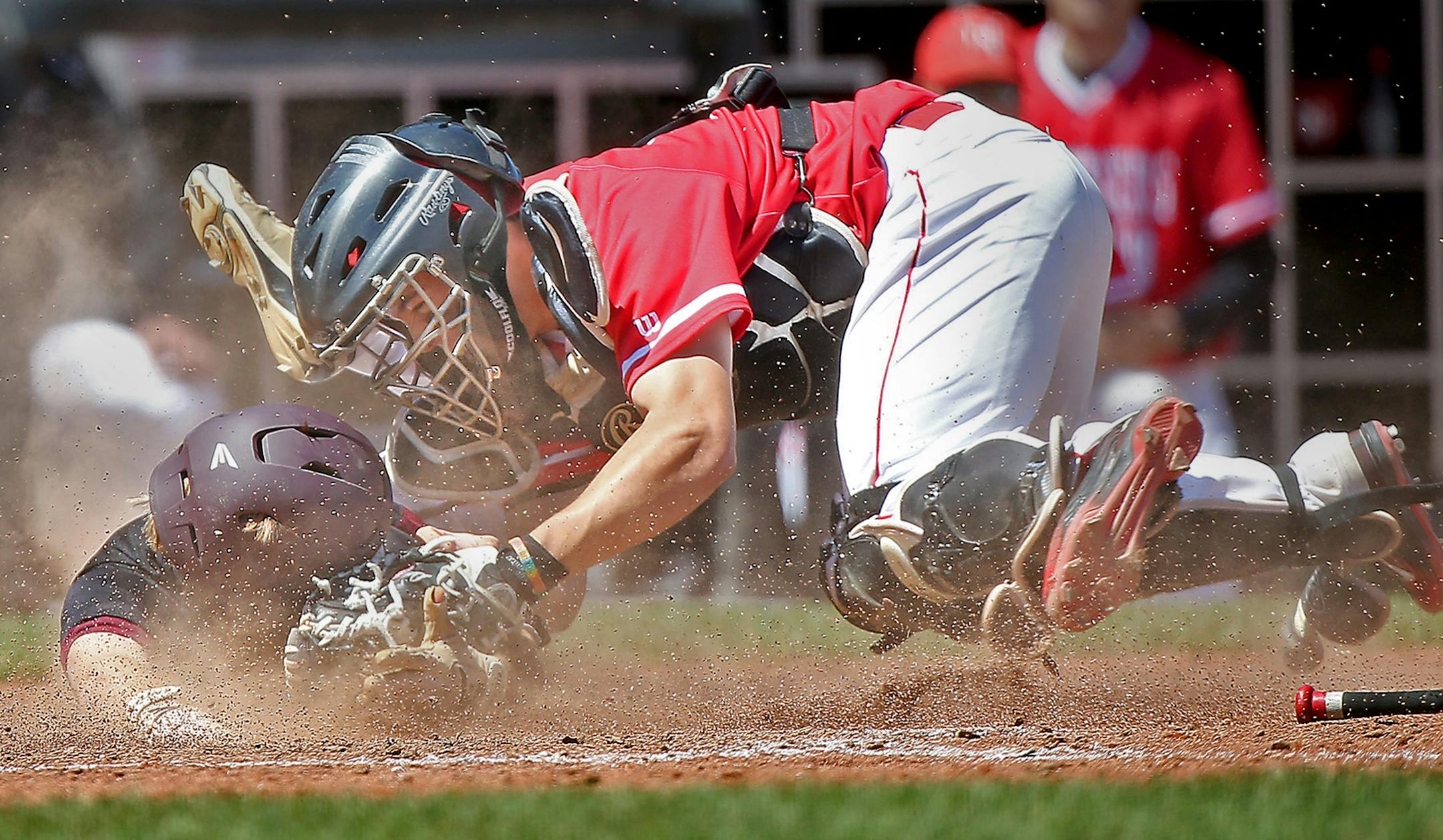 Lakeville North's Nick Juaire tagged out Anoka's Bowen Olson at home plate in the fourth inning during the Class 3A baseball quarterfinals at CHS Field, Friday, June 12, 2015 in St. Paul, MN. Lakeville North defeated Anoka 3-0. ] (ELIZABETH FLORES/STAR TRIBUNE) ELIZABETH FLORES ï eflores@startribune.com ORG XMIT: MIN1506121658021131