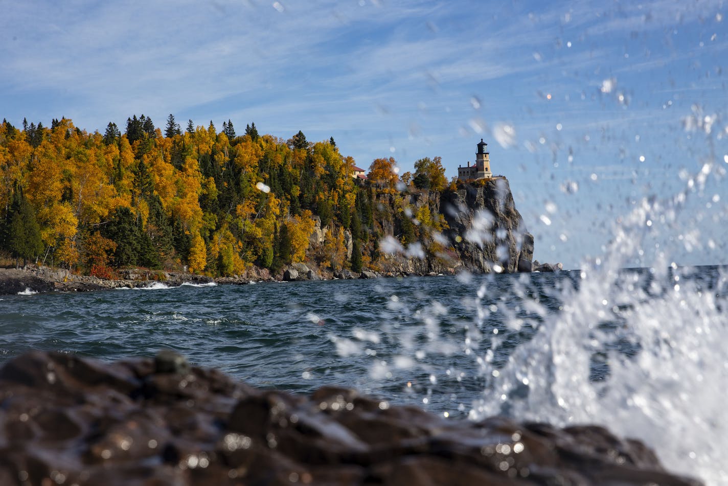 Lake Superior kicked up some spray in front of the peak foliage along the North Shore by the Split Rock Lighthouse in Two Harbors, MN. ]
ALEX KORMANN &#x2022; alex.kormann@startribune.com Fall colors were at the tail end of their peak along the North Shore on Wednesday October 9. 2019. With snow expected this coming weekend, it was the last chance to see the colors in their full glory.