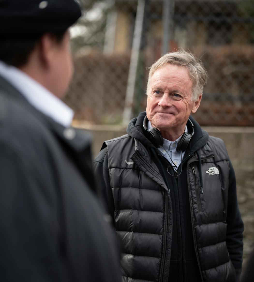 Director Patrick Coyle talked with actor Ernest Briggs as they filmed a scene near Coyle's house. After raising his daughters in south Minneapolis, Coyle and his wife moved to St. Paul four years ago. 