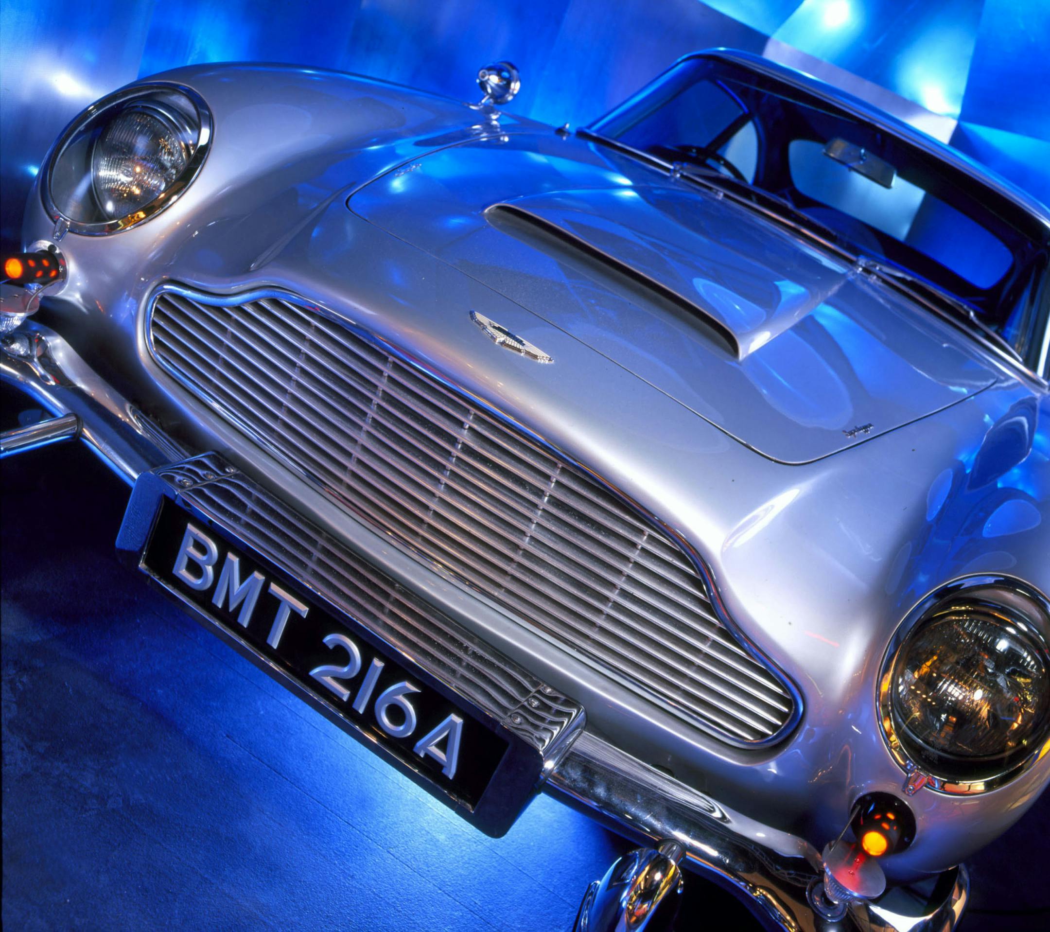 The Aston Martin DB5 on display at the International Spy Museum in Washington, D.C., first appeared in the 1964 James Bond thriller "Goldfinger." The ultimate spy car came fully loaded with machine guns, tire slashers, bulletproof shield, oil jets, dashboard radar screen, rotating license plate and ejector seat. (International Spy Museum)