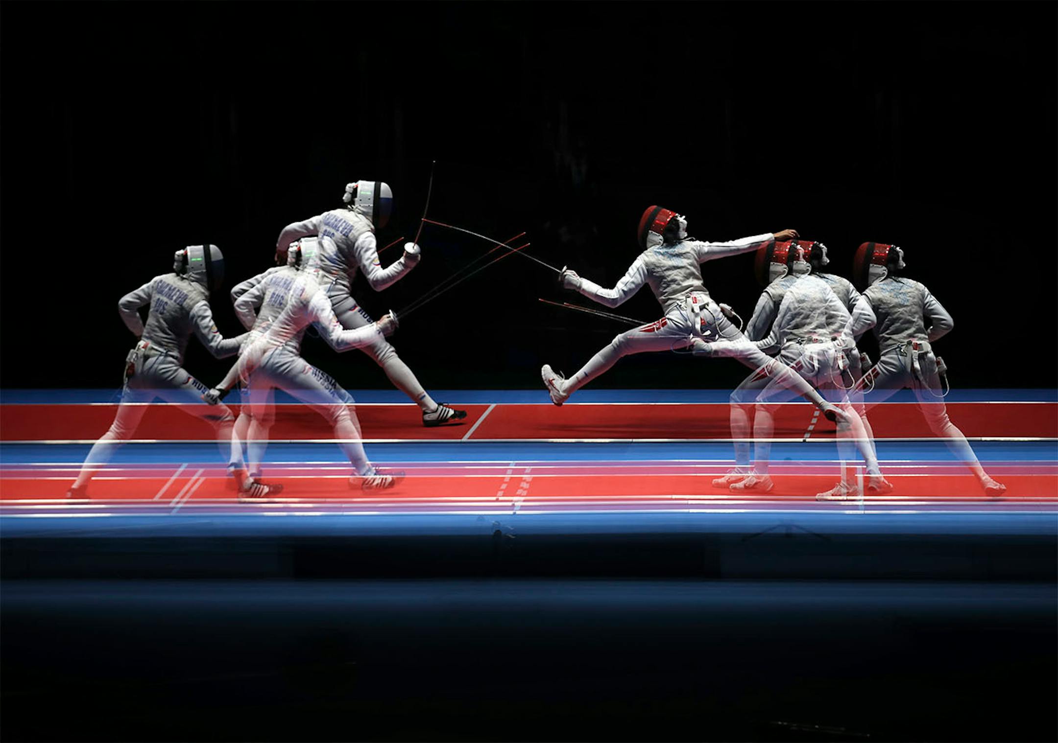 Russia�s Aida Shanaeva (left) and Tunisia�s Ines Boubakri battled it out in the women�s foil bronze medal bout. Boubakri won the match and the bronze medal.