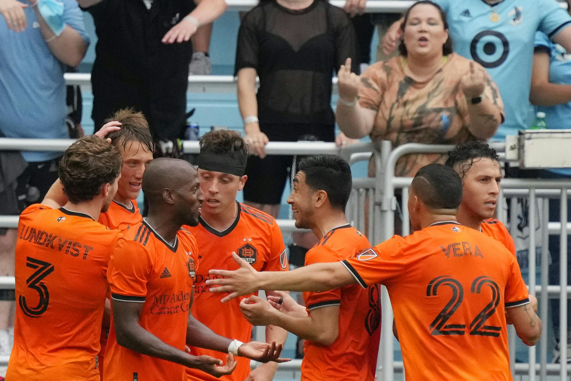 Houston Dynamo players celebrate after scoring in the first half of an MLS game between Minnesota United and the Houston Dynamo.