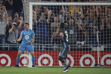 Minnesota United's Vito Mannone (1) celebrates after saving an MLS soccer match-sealing penalty kick in stoppage time of an MLS soccer match against F