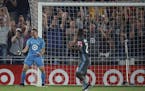 Minnesota United's Vito Mannone (1) celebrates after saving an MLS soccer match-sealing penalty kick in stoppage time of an MLS soccer match against F