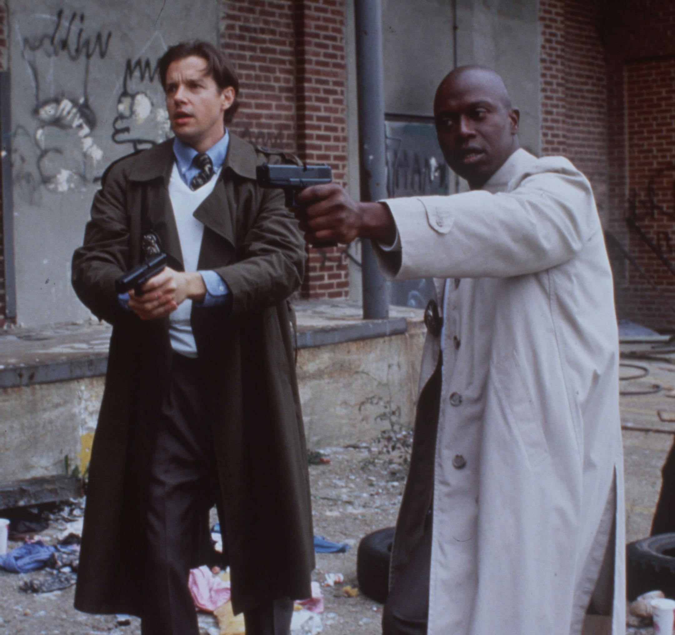 Kyle Secor (at left) stars as Tim Bayliss, and Andre Braugher (at right) stars as Frank Pembleton, both detectives in the television show HOMICIDE: LIFE ON THE STREET. Photo is courtesy of NBC Television. ORG XMIT: MIN2013030517253341