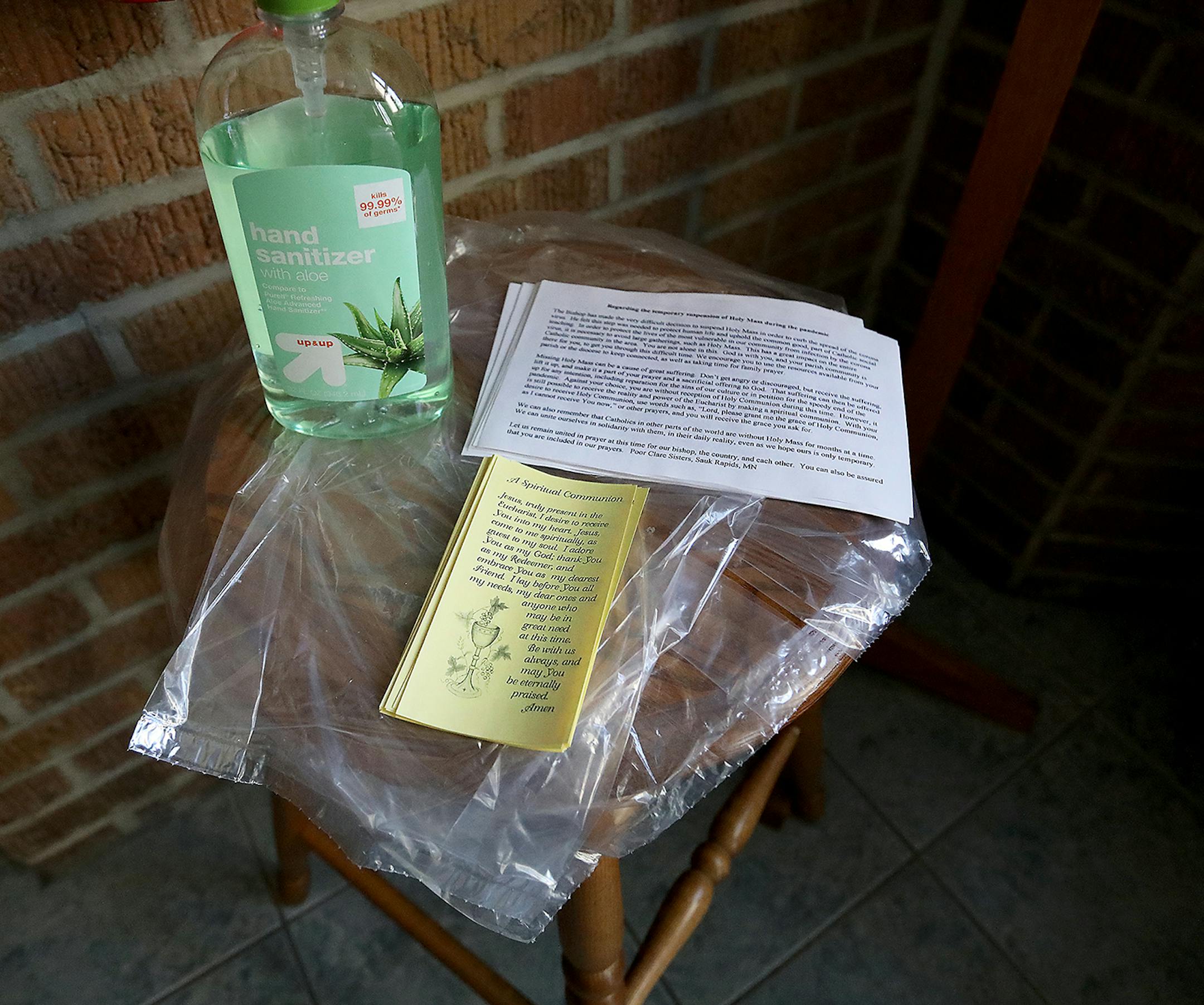 Hand sanitizer near the the door leading to the public entrance of the Poor Clares of Sauk Rapids St. Clare Monastery Chapel Thursday, April 16, 2020, in Sauk Rapids, MN.Poor Clare nuns of St. Clare's Monastery nuns met with journalists in the monastery's parlor, the one room where outsiders have partial access to the nuns in a room divided by a metal lattice with a folding wooden divider.