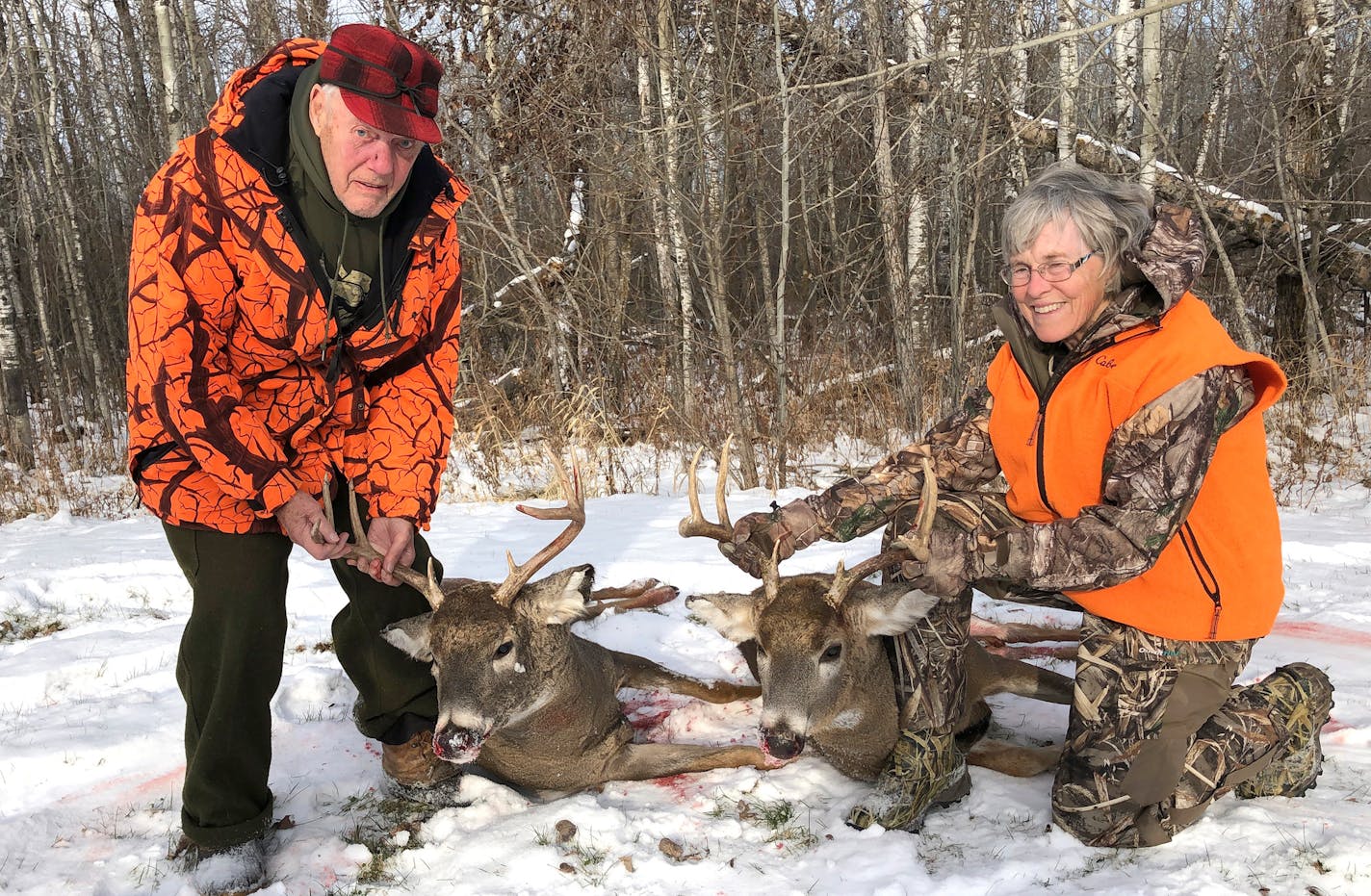 Bud Grant and Pat Smith show off their haul.