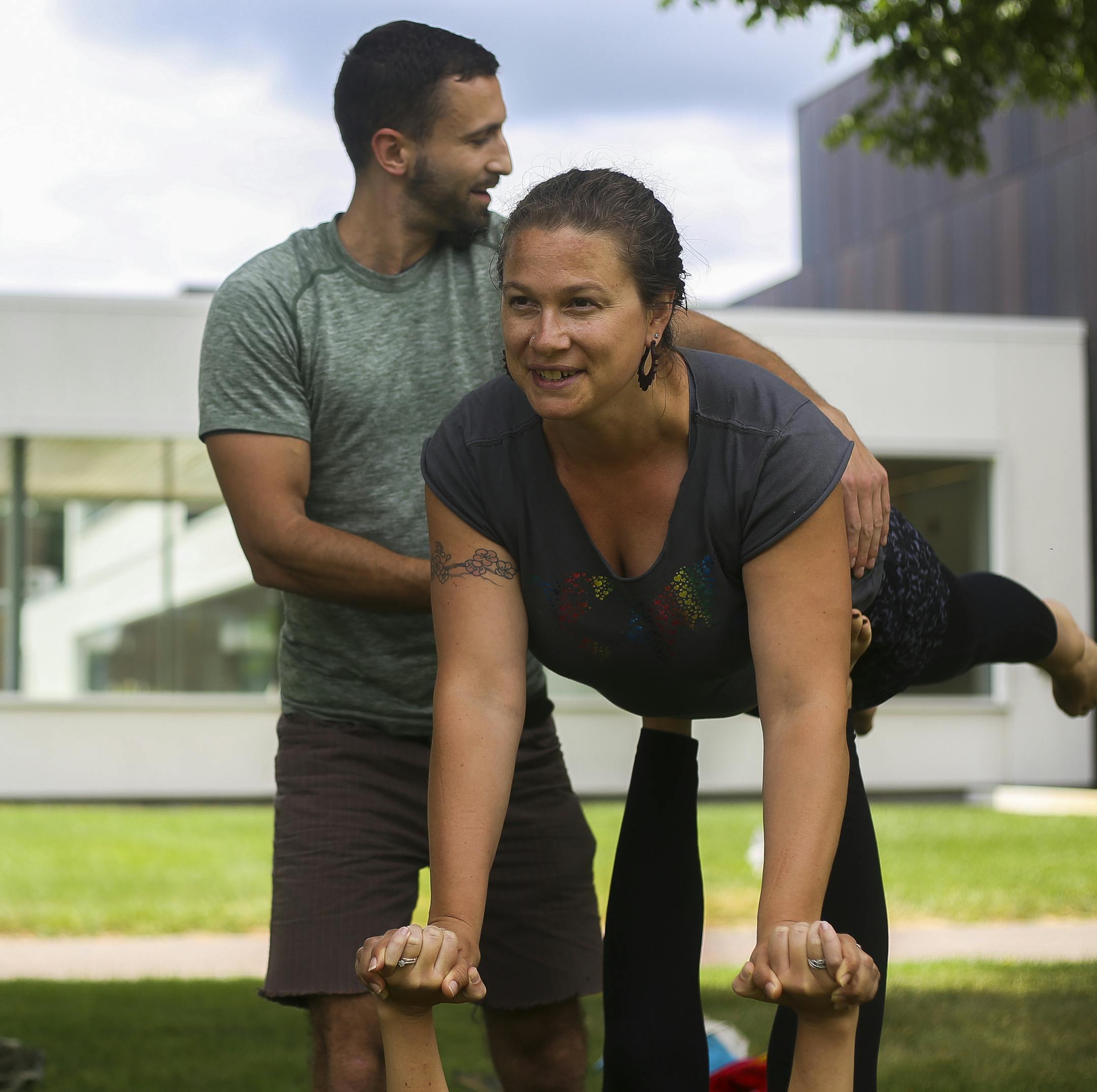 Mari Bartoo-Jacobson of Portland, Oregon is balanced by Elaine Meyer-Lee of Decatur, Georgia (not photographed) during an informal acroyoga session. Acroyoga is used as an example of how to settle one's body and energy to center and channel them to stay focused on a single task at hand. ] Timothy Nwachukwu • timothy.nwachukwu@startribune.com More than 1,000 members of the Religious Society of Friends or Quakers participated in the faith's annual Friends General Conference at the College o