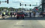 Protesters headed away from the fair late Saturday afternoon.