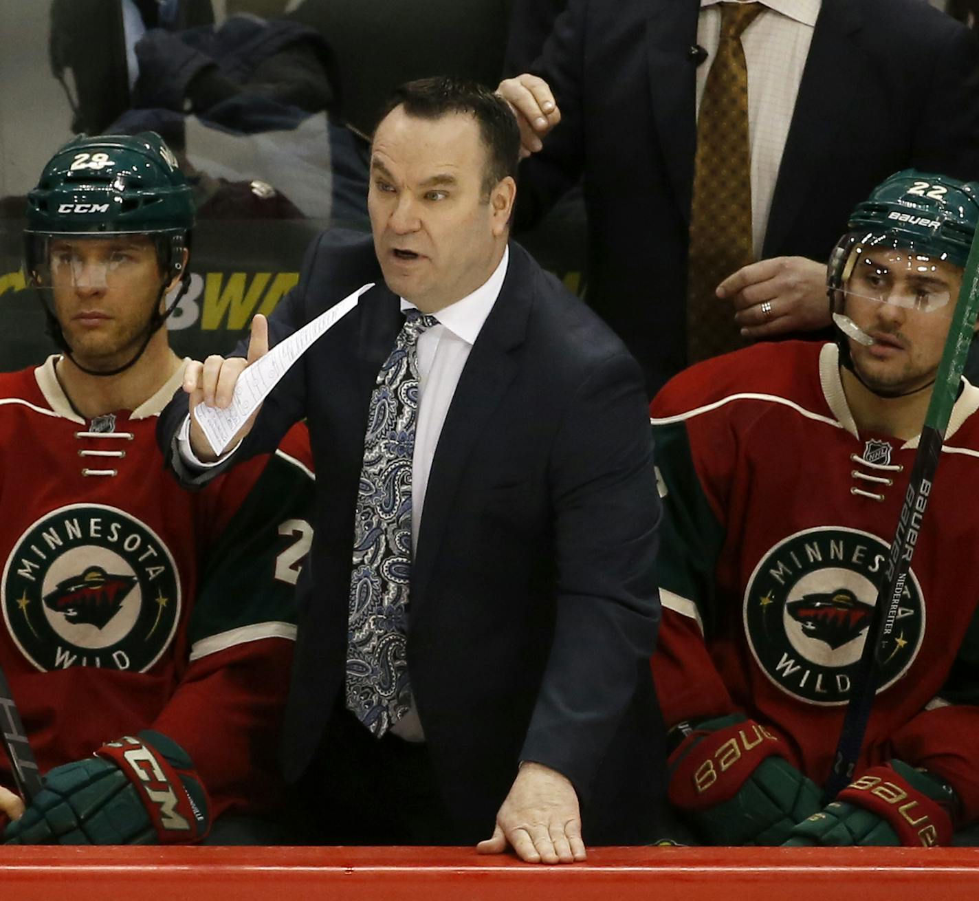 Minnesota Wild head coach John Torchetti calls out to a referee during the third period of an NHL hockey game in St. Paul, Minn., Sunday, Feb. 28, 2016. The Wild won 3-1. (AP Photo/Ann Heisenfelt) ORG XMIT: OTKAH115