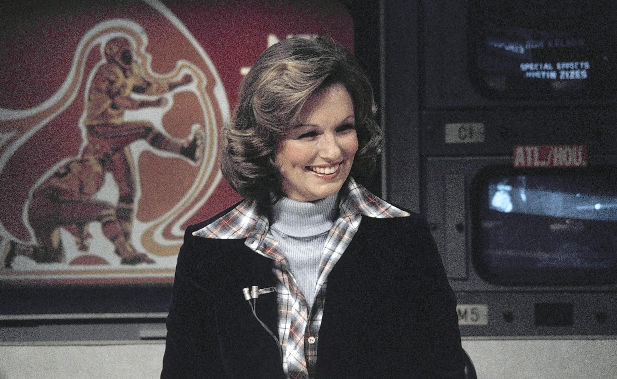 FILE - In this Nov. 28, 1976 file photo, CBS sportscaster Phyllis George is seen in New York. Phyllis George, the former Miss America who became a female sportscasting pioneer on CBS's "The NFL Today" and served as the first lady of Kentucky, has died. She was 70. A family spokeswoman said George died Thursday, May 14, 2020, at a Lexington hospital after a long fight with a blood disorder.(AP Photo/Suzanne Vlamis, File)