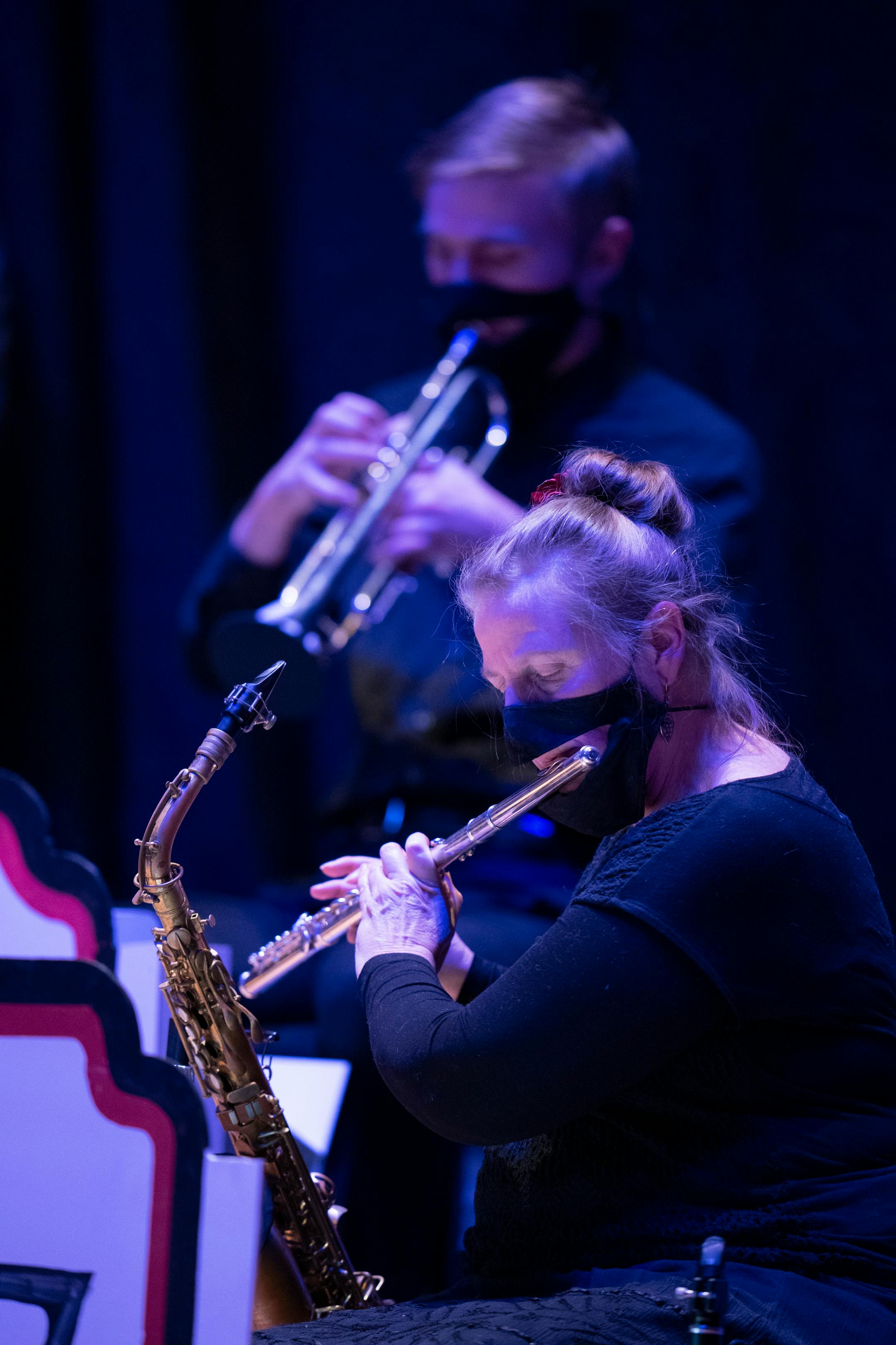 Members of the big band in the musical The 1940's Radio Hour are also all wearing masks, although with openings to accommodate their instruments, including Debbie Clapp playing the flute and Kyler Bahrke on trumpet.