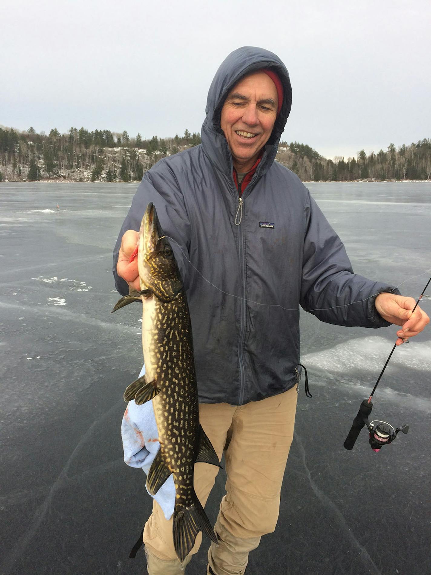 Landing northerns on new ice in the Boundary Waters Canoe Area Wilderness.