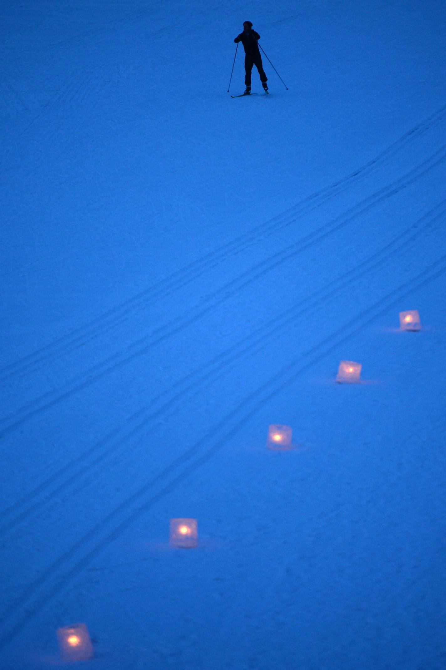 A lone cross country skier carved their own path on Lake of the Isles just after sunset during the Luminary Loppet Saturday night. ] (AARON LAVINSKY/STAR TRIBUNE) aaron.lavinsky@startribune.com The Luminary Loppet night of the City of Lakes Loppet Ski Festival was held Saturday, Feb. 6, 2016 at Lake of the Isles in Minneapolis, Minn.