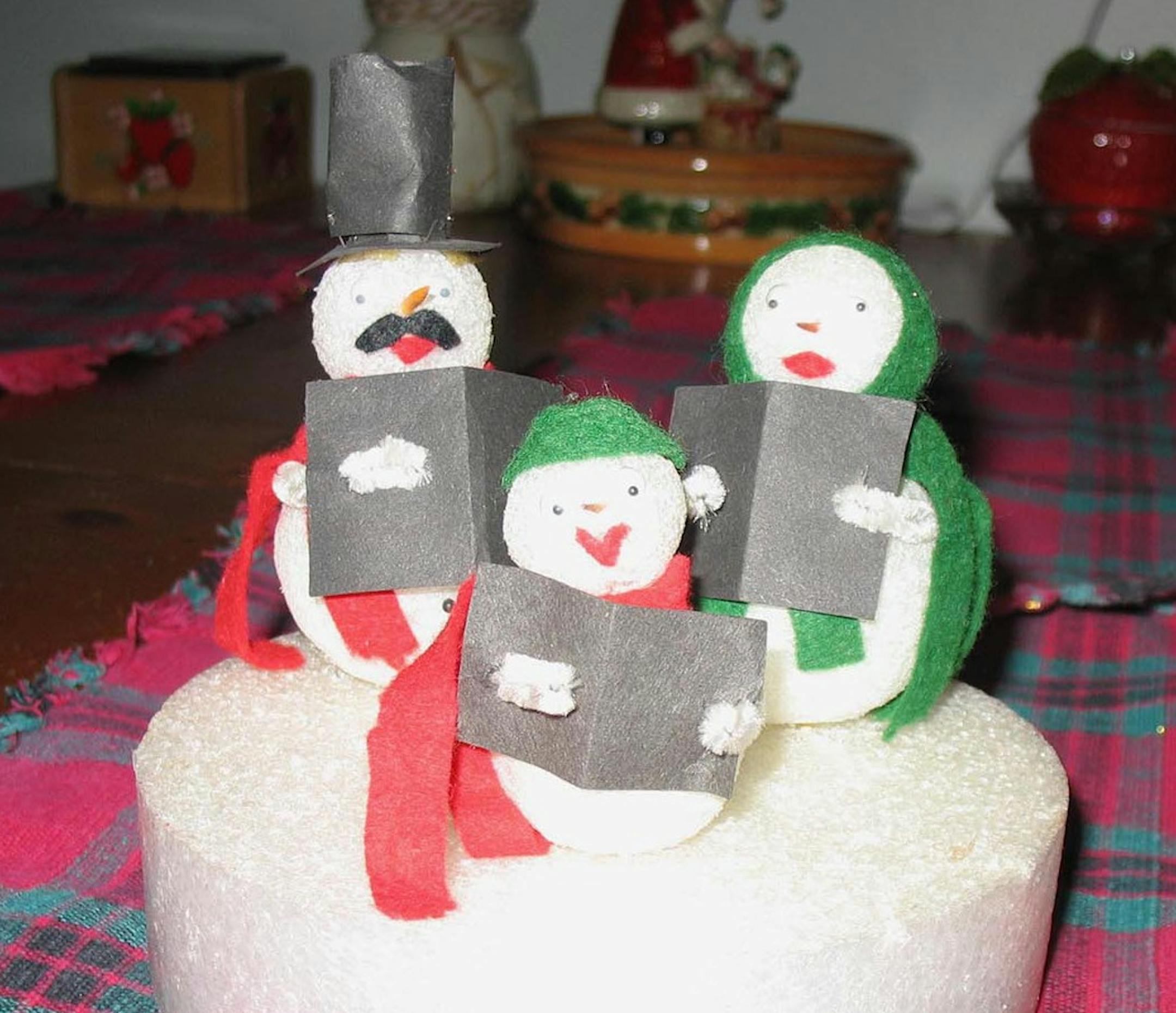 "The attached photo is a picture of a ";Singing Snowman Family"; decoration I made when I was 10 years old (50 years ago). My mom displayed this in her home every Christmas until she died in 2002. I've displayed it in my own home since then. It's not very fancy and it's getting a little worn, but whenever I look at i'm reminded of my mother and how delighted she seemed to be with my creation." Carla Christopherson, Brainerd
