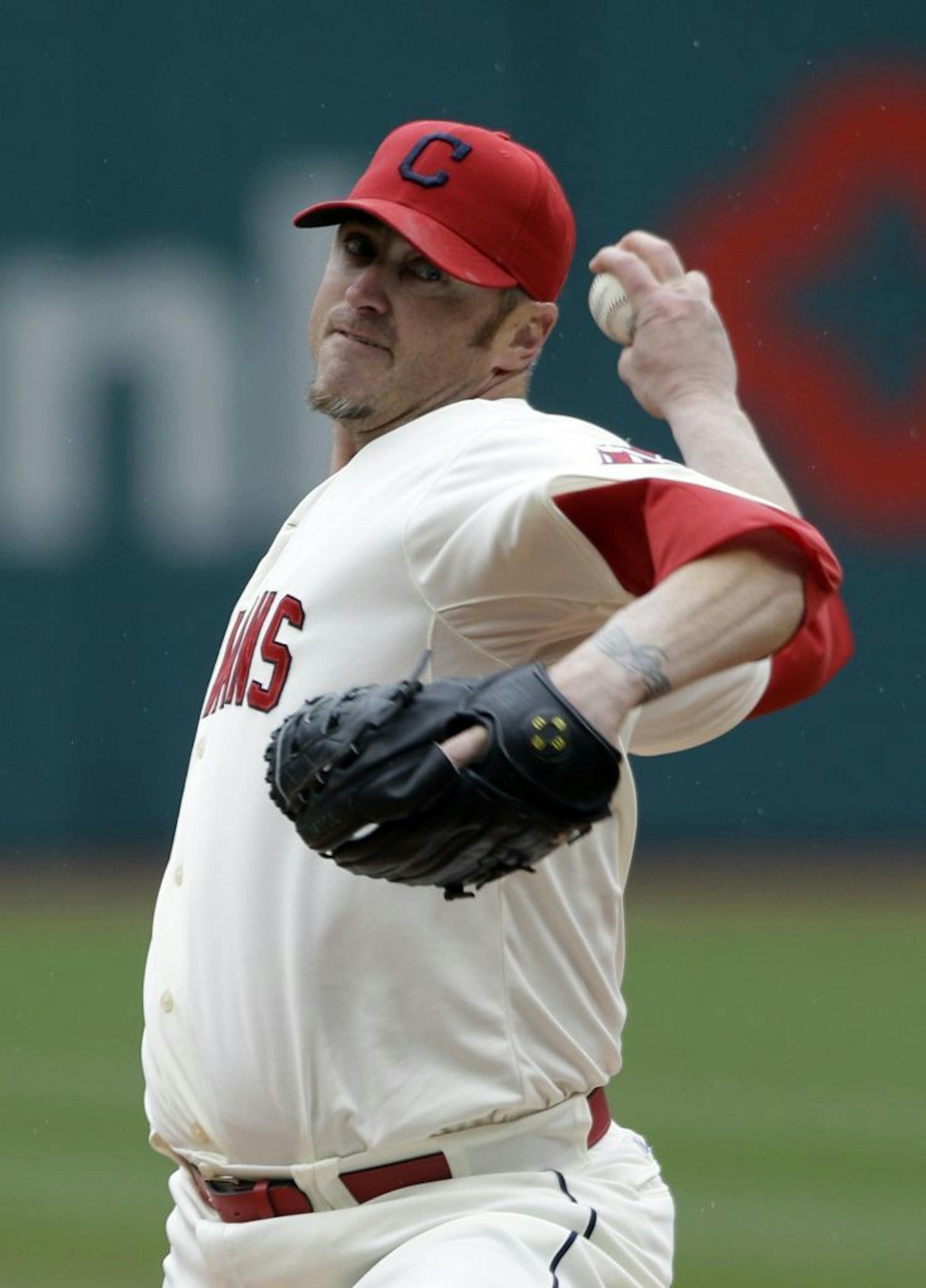 Cleveland Indians starting pitcher Brett Myers delivers against the Chicago White Sox in the first inning of a baseball game on Sunday, April 14, 2013, in Cleveland.