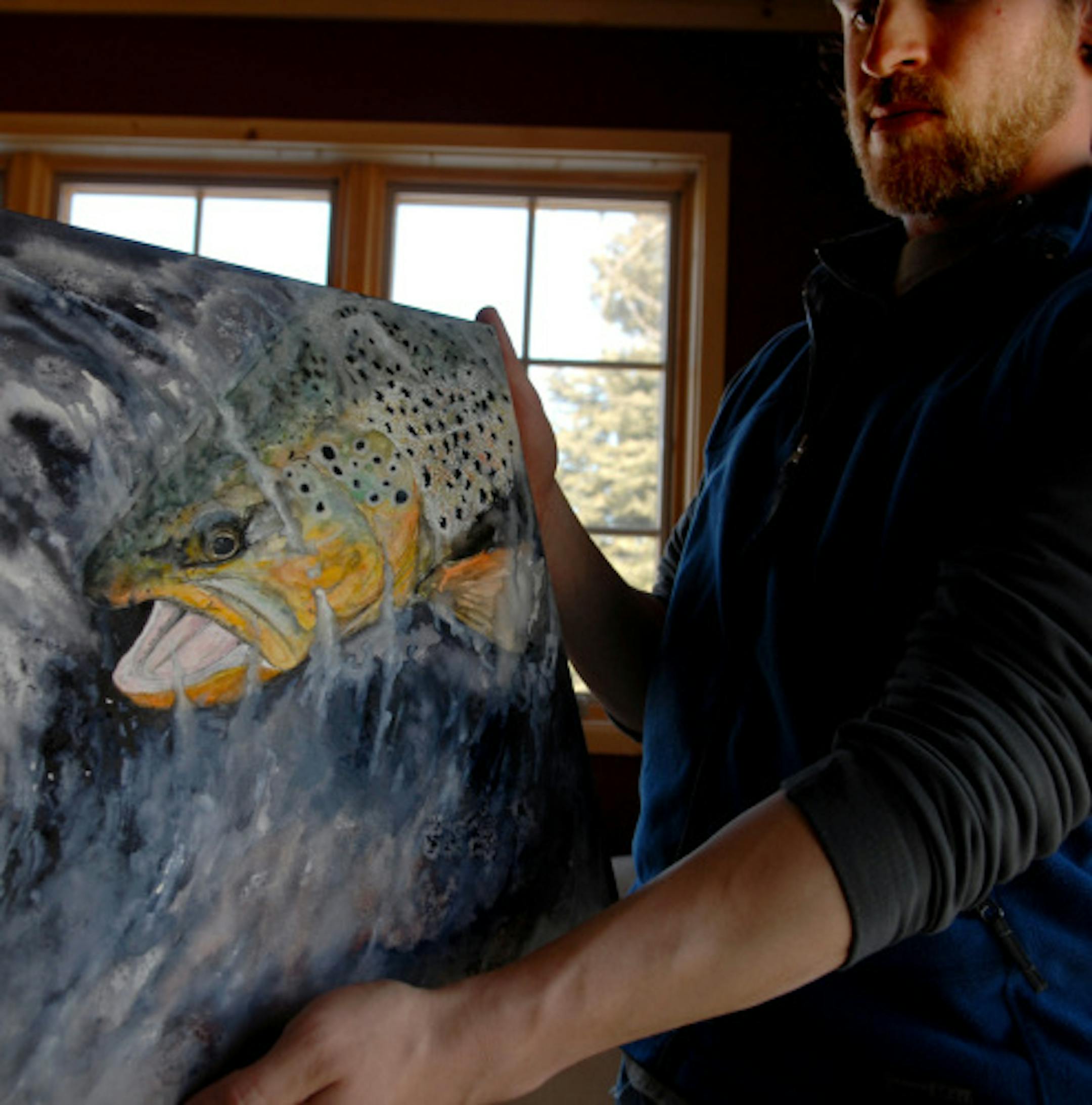 Tim Pearson paints salmon and trout, the species he fishes each spring and fall on the shores of Lake Superior, and in summer in Alaska.