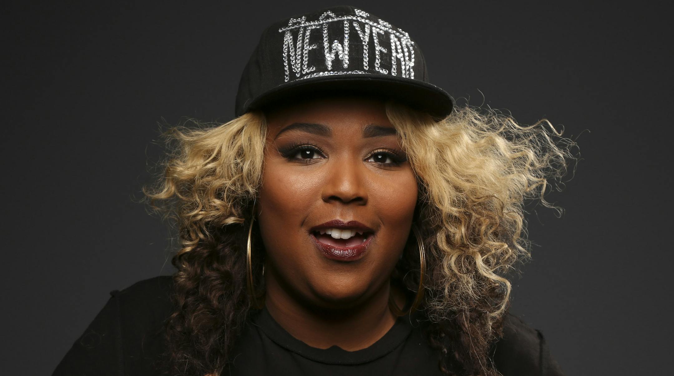 The singer Lizzo was all ready for New Year's Eve when photographed in the studio Tuesday afternoon, December 10, 2013. ] JEFF WHEELER ‚Ä¢ jeff.wheeler@startribune.com
