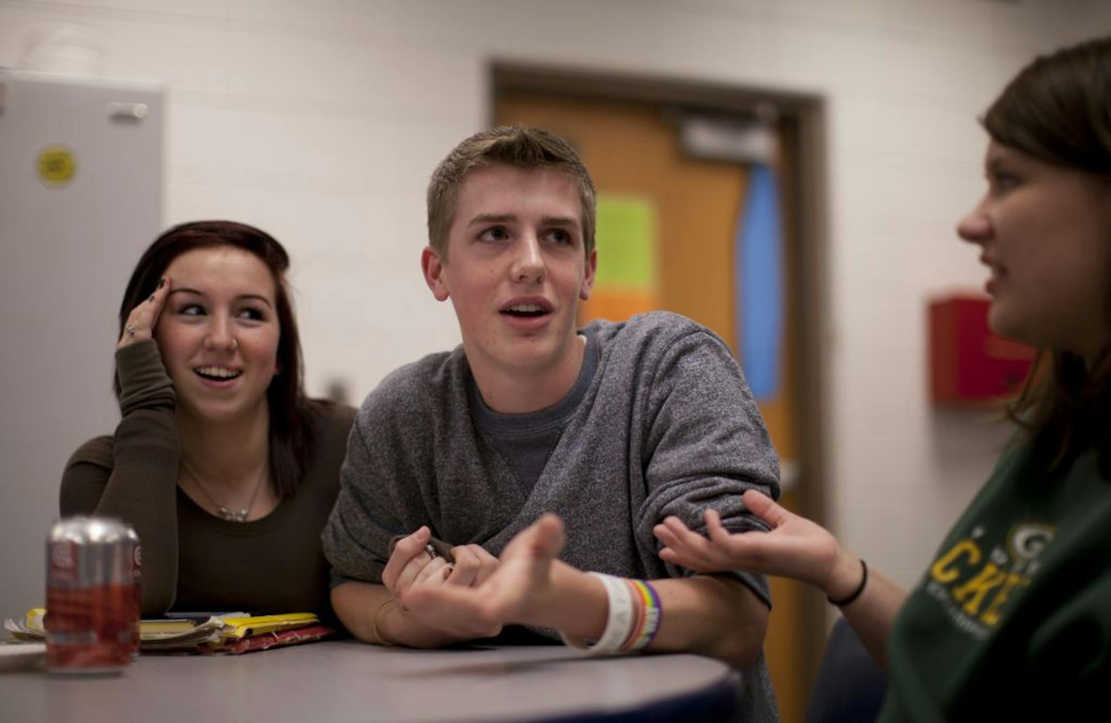 Lauren Slind, Lucas Rorvick and Shannon Haver participated in an after-school meeting of the Gay Straight Alliance at Champlin Park High School last week. Rorvick said that antigay slurs have decreased overall but that there are still incidents of obvious derision.