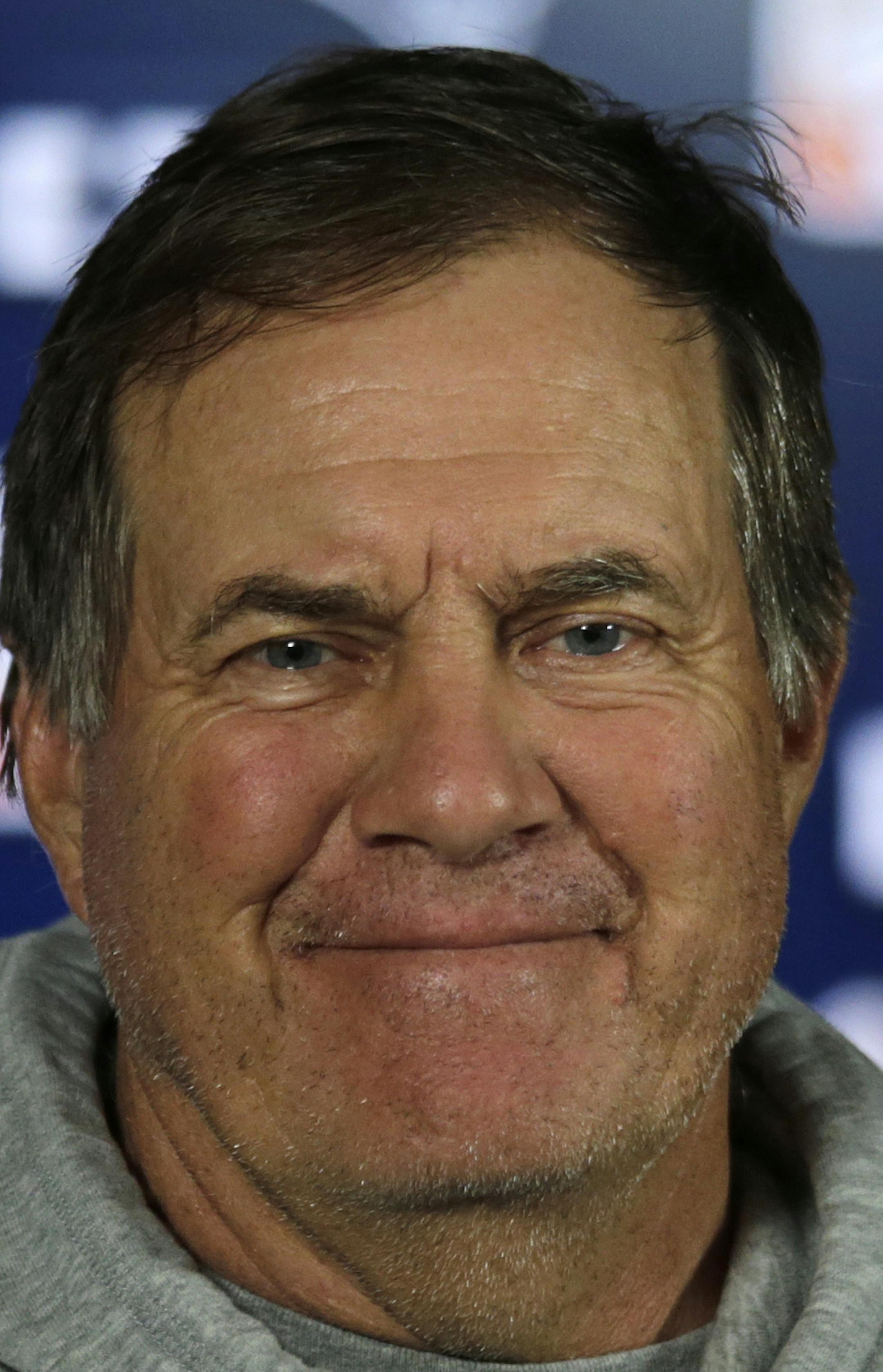 New England Patriots head coach Bill Belichick smiles during a football news conference at Gillette Stadium in Foxborough, Mass., Wednesday, July 23, 2014. Players reported to training camp with their first team practice scheduled for Thursday July 24th. (AP Photo/)