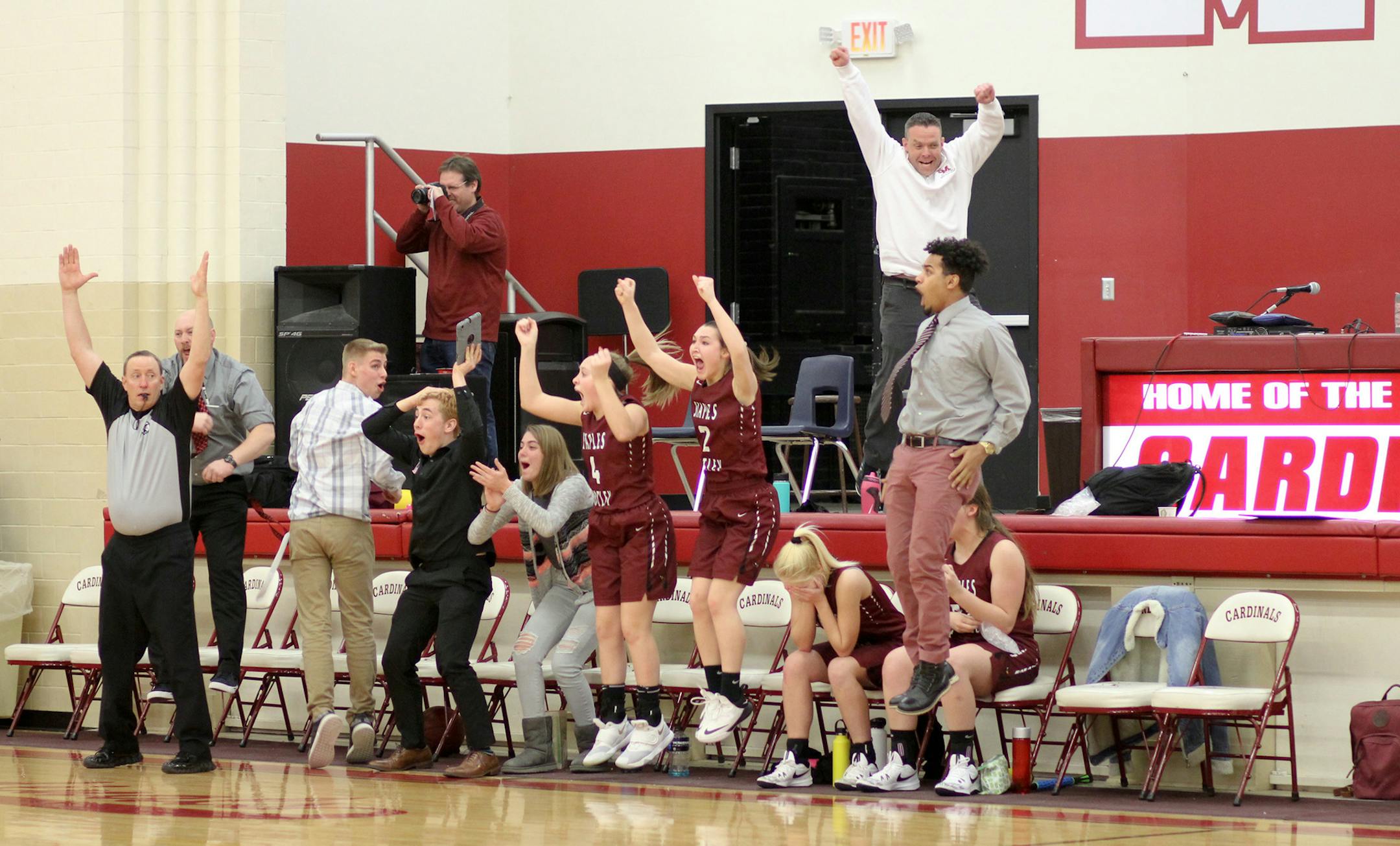 Jody Hagenson, Staples
The Staples Motley girls basketball team bench goes crazy when their teammate makes a 3 point shot to tie the game in the final seconds of their game against Pillager.