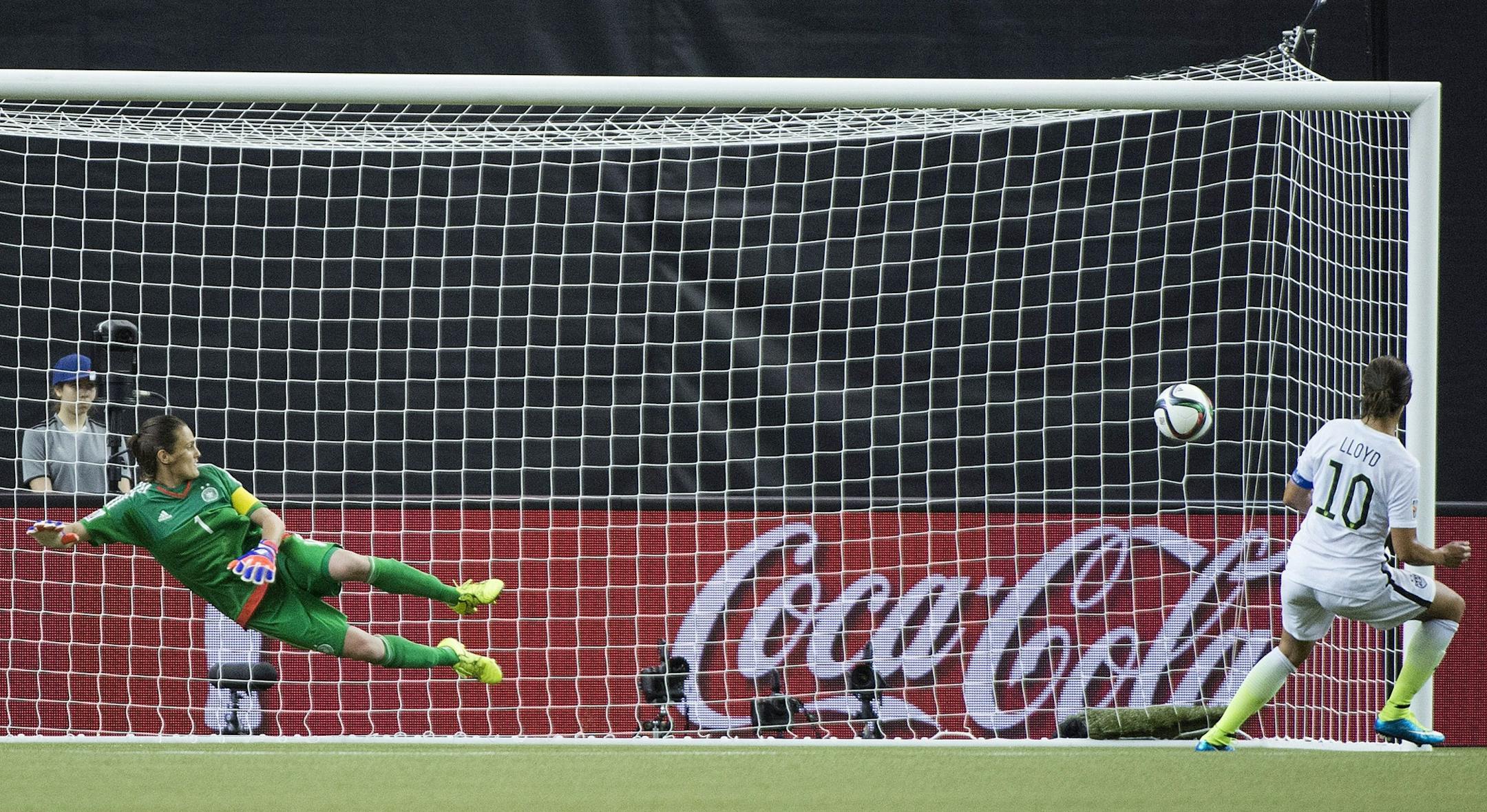 United States' Carli Lloyd (10) scores a penalty shot against Germany keeper Nadine Angerer during the second half of a semifinal in the Women's World Cup soccer tournament, Tuesday, June 30, 2015, in Montreal, Canada. The United States won 2-0.