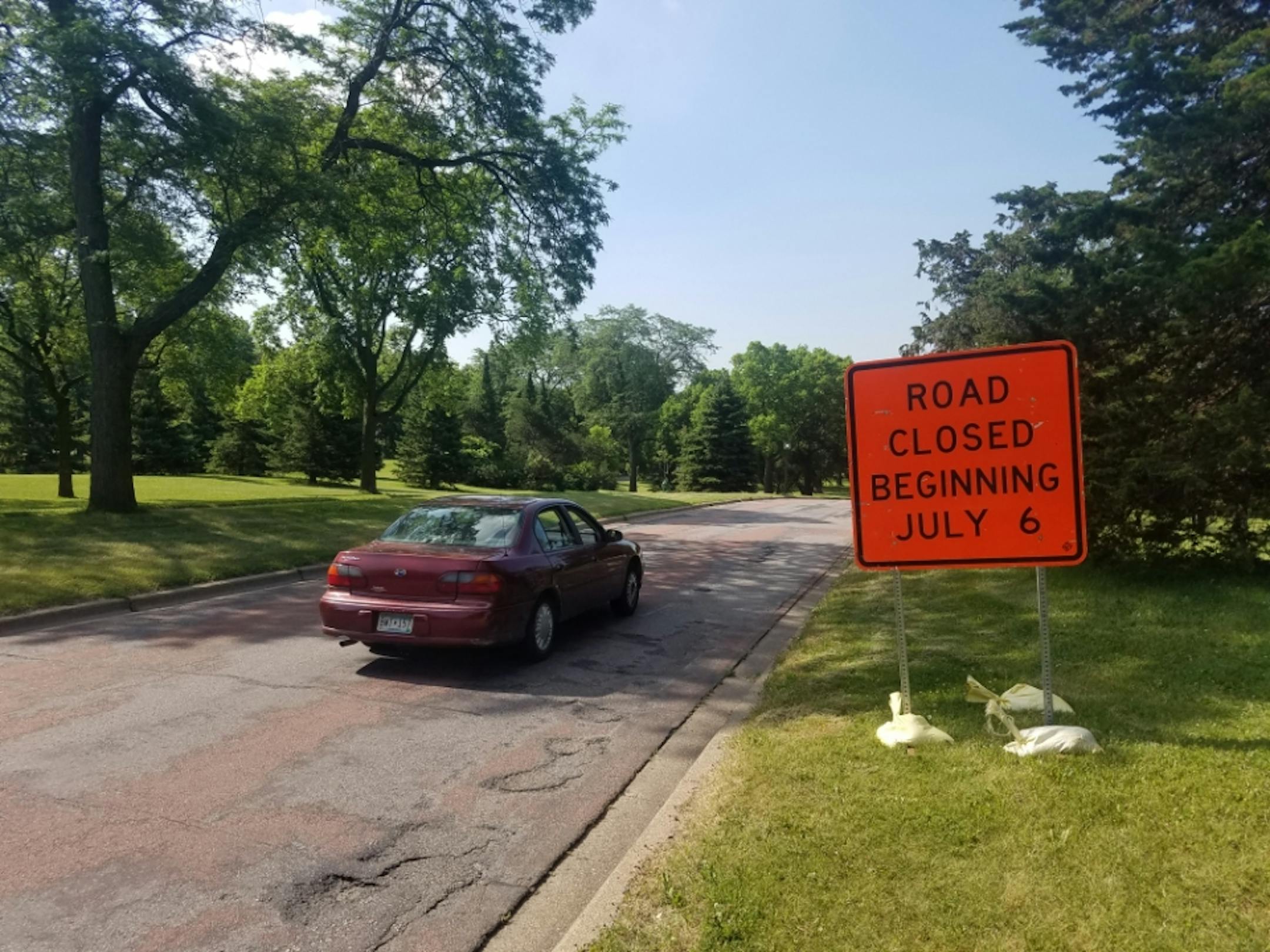 A sign warns drivers on Theodore Wirth Parkway that the road will be closed starting Monday July 6. Crews will be repaving the section from N. 29th Avenue to Golden Valley Road.