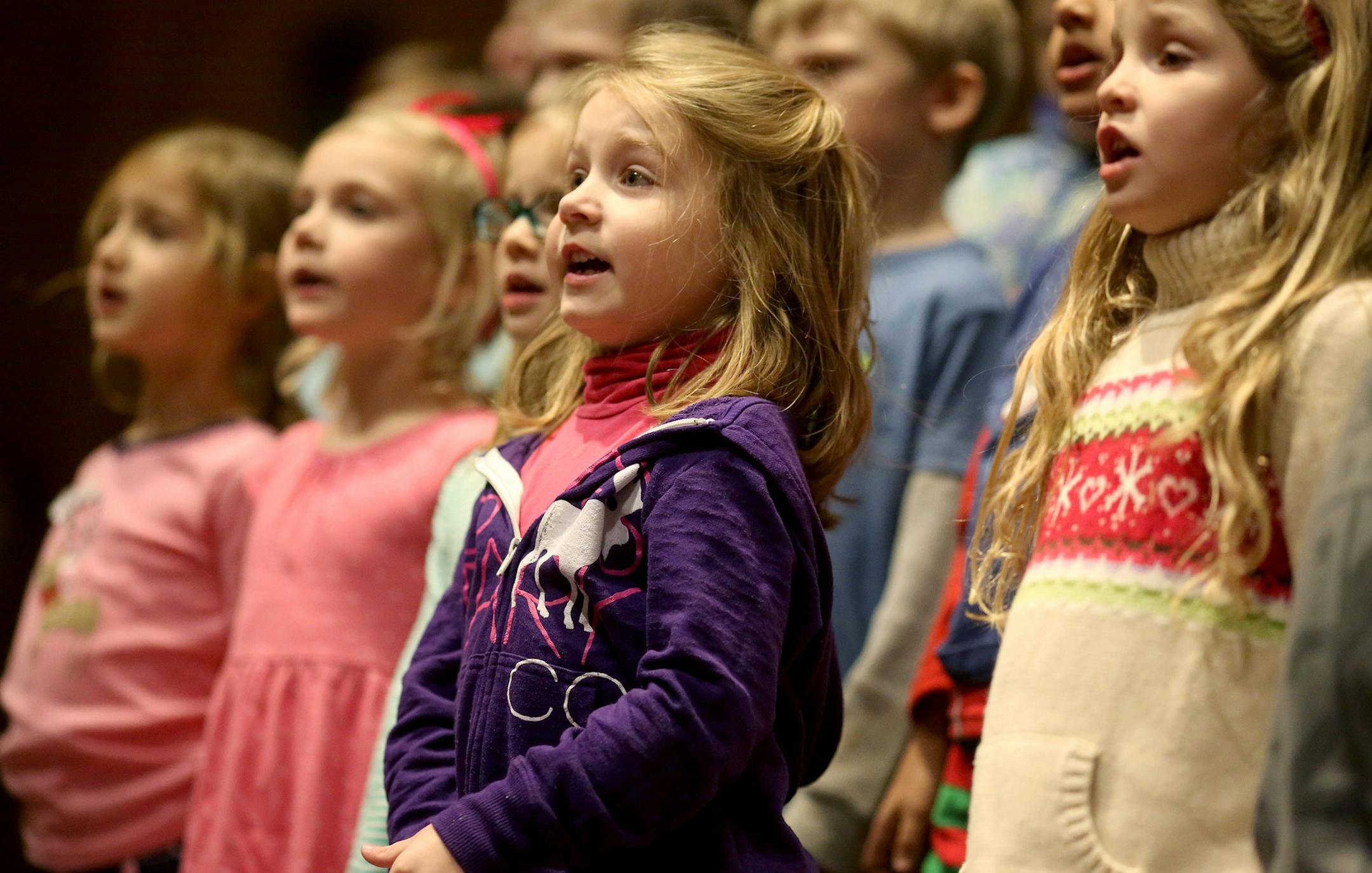 Gabriella Daly, 5, and the rest of the choir rehearsed for Christmas Eve at St. Philip the Deacon Lutheran Church in Plymouth.