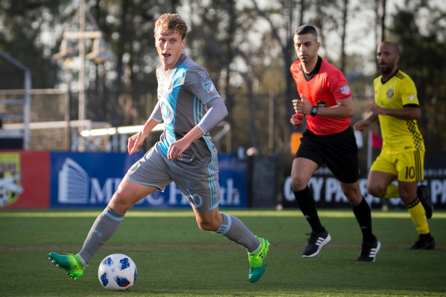 Minnesota United midfielder Rasmus Schuller (20) dribbles the ball during the first half of an MLS match against the Columbus Crew, Saturday, Feb., 24, 2018, at the 2018 Carolina Challenge Cup in Charleston, S.C. (AP Photo/Stephen B. Morton) ORG XMIT: SCSM130