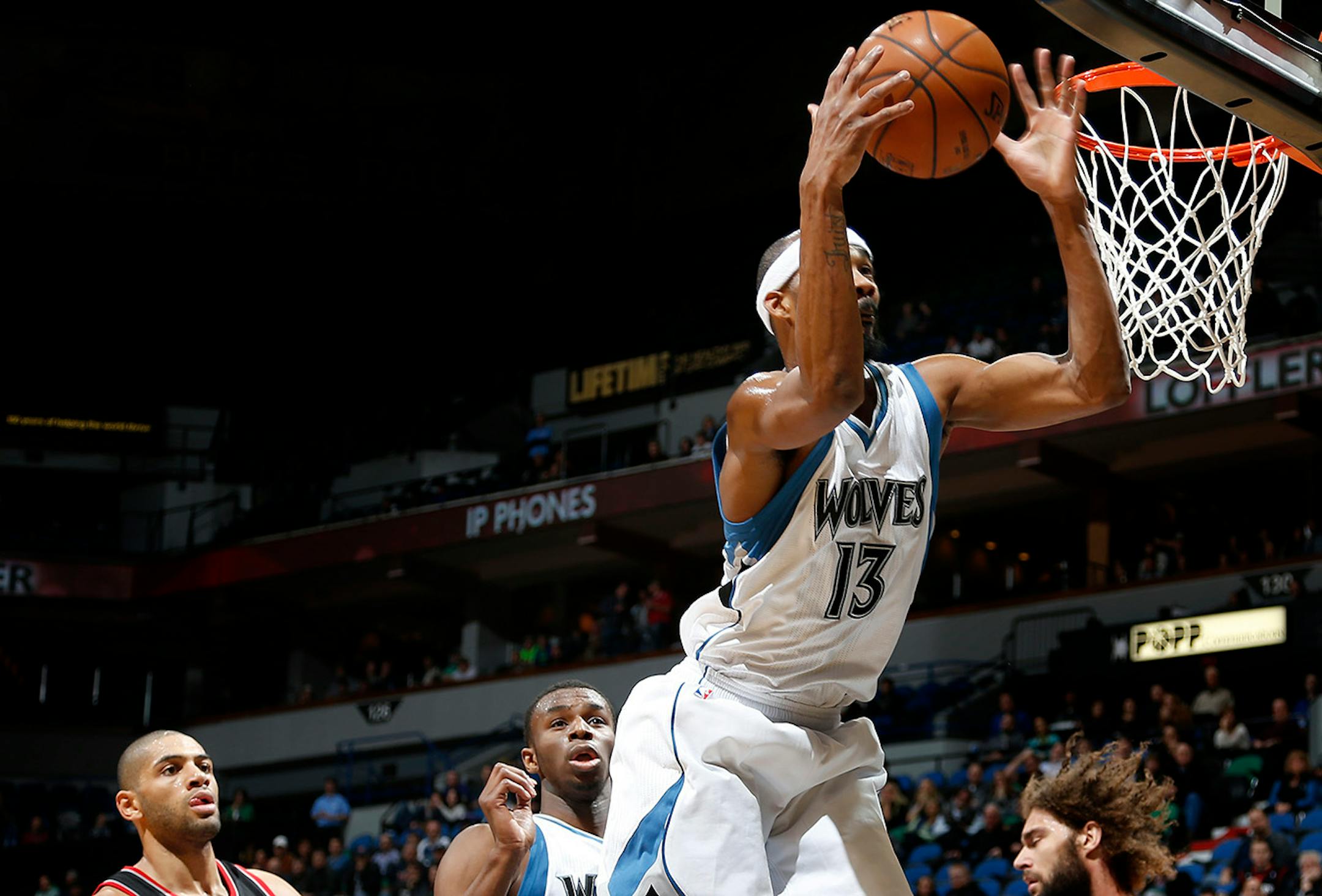 Corey Brewer (13) grabbed a rebound in the fourth quarter. Minnesota beat Portland by a final score of 90-82. ] CARLOS GONZALEZ cgonzalez@startribune.com - December 10, 2014 – Minneapolis, Minn., Target Center, NBA, Minnesota Timberwolves vs. Portland Trail Blazers