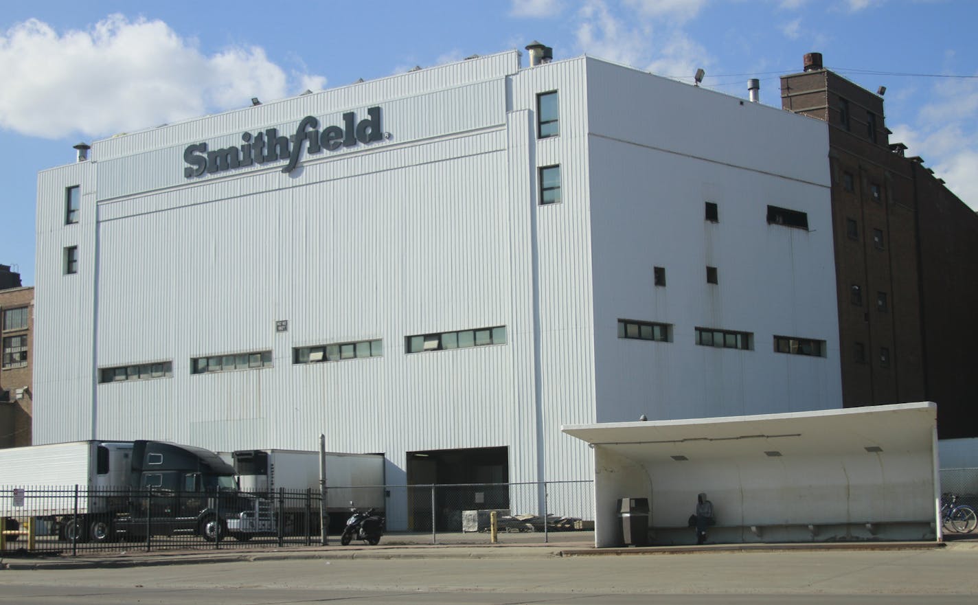 Smithfield said it will close its giant pork processing plant in Sioux Falls, S.D., shown in a photo taken Wednesday, where health officials reported more than 80 employees have confirmed cases of the coronavirus.