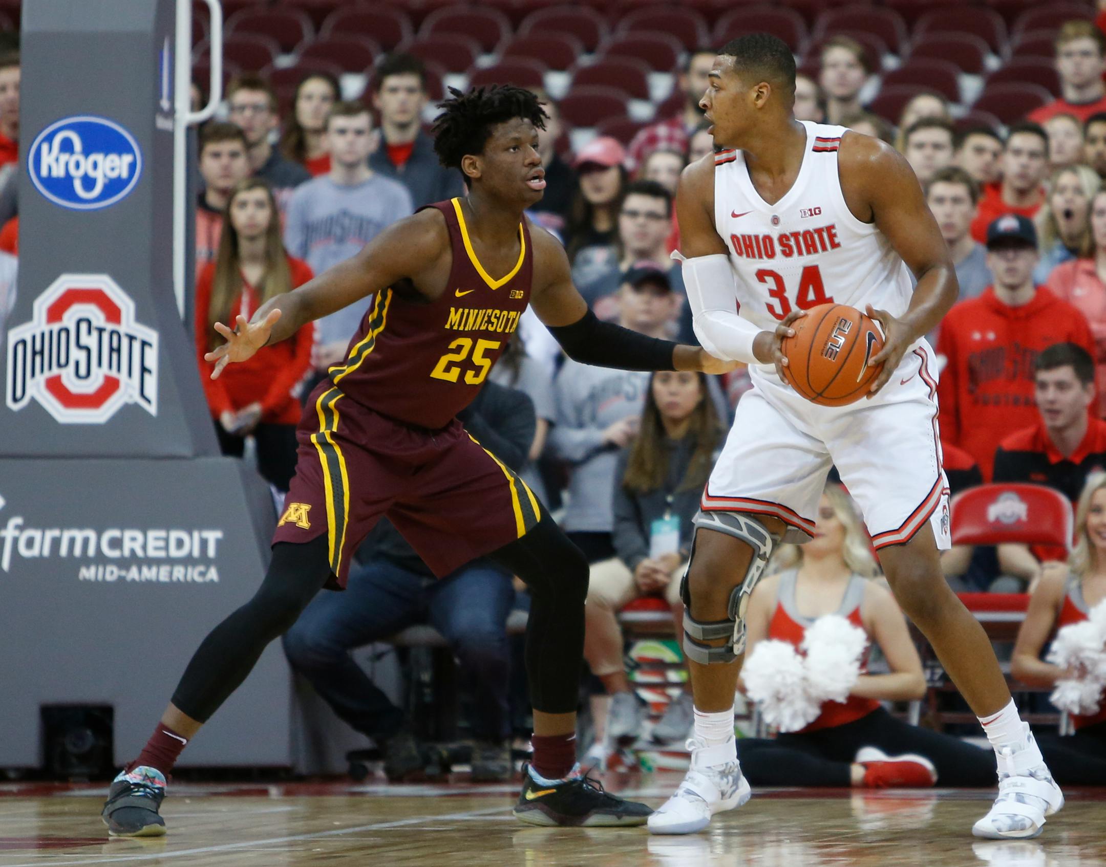Ohio State's Kaleb Wesson, right, posts up against Minnesota's Daniel Oturu during the first half of an NCAA college basketball game Sunday, Dec. 2, 2018, in Columbus, Ohio. (AP Photo/Jay LaPrete)