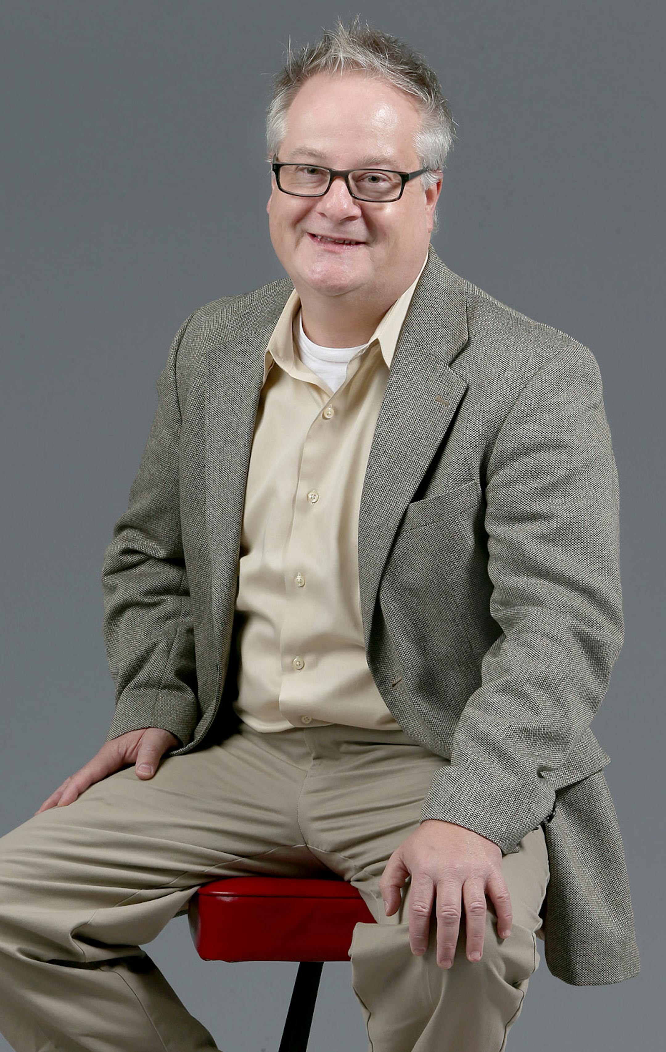 Michael Maupin before his makeover, Monday, October 21, 2013. In a fashion world that constantly speaks to youth, deciding what to wear to the office can be a daunting. According to image consultants in the Twin Cities, clothes play a bigger part in the working world than one might think. Since 85 percent of communication is nonverbal, you want your clothes to send the right message about you at work. What do your business clothes say about you? (ELIZABETH FLORES/STAR TRIBUNE) ELIZABETH FLORES &