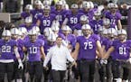 The St. Thomas football team enters the field during the 2016 NCAA Division III playoffs.