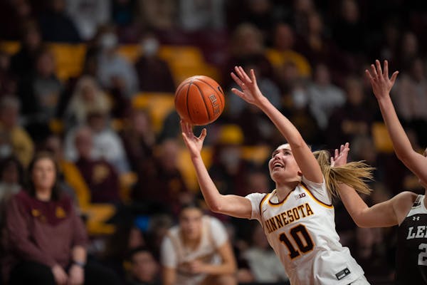 Minnesota Gophers guard Mara Braun (10) tossed up a shot in the fourth quarter of their game Sunday, Nov. 13, 2022 at Williams Arena in Minneapolis. S