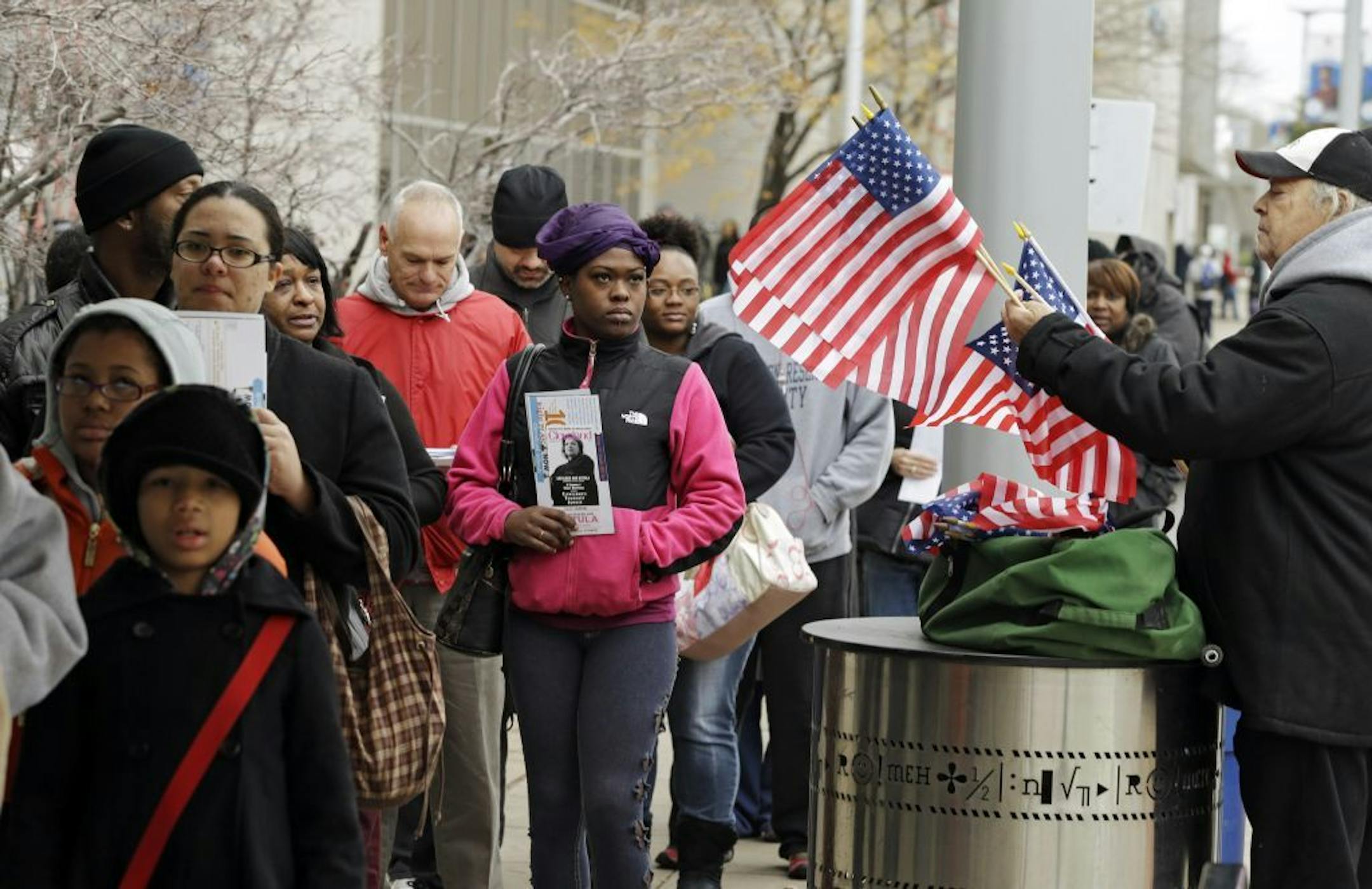 Voiters wait in line outside the Cuyahoga County Board of Elections in Cleveland on the final day of early voting Monday, Nov. 5, 2012. About 1.6 million people have voted early in Ohio.