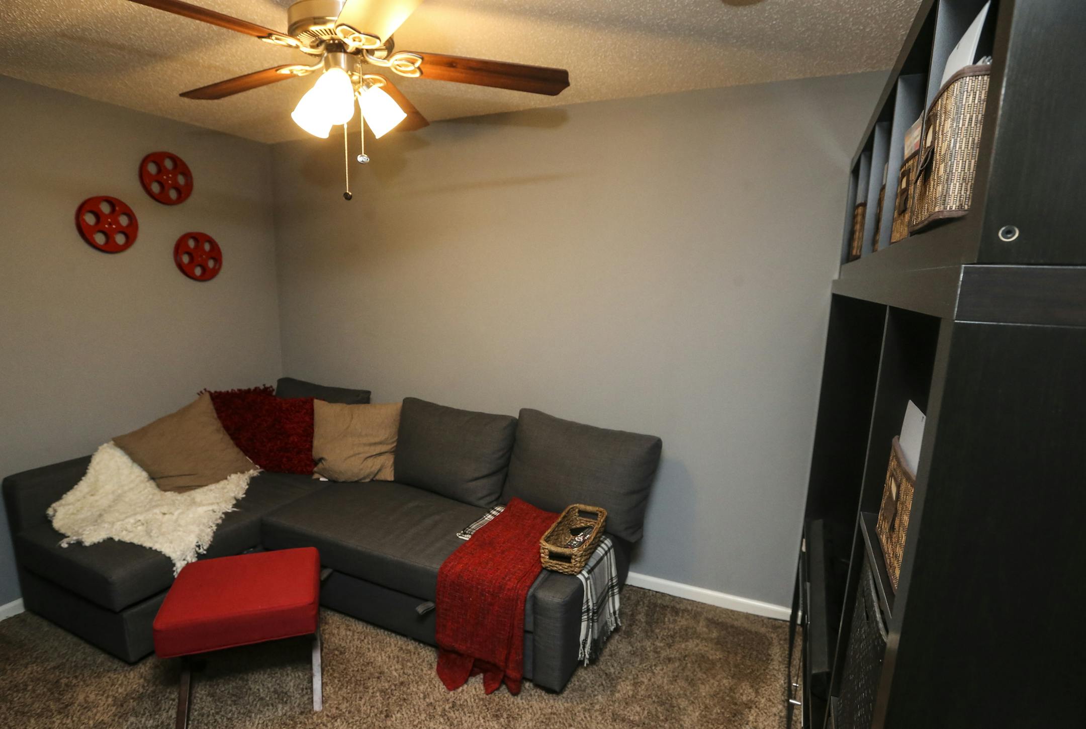 Missi and Tyler Franz's basement family room in their new home in Columbia Heights, Minn. ] RENÉE JONES SCHNEIDER reneejones@startribune.com The city of Columbia Heights bought some of the ugliest, skankiest houses in the city. They tore them down and built new, sleek 1200 sq ft two stories designed for those conflicted young homebuyers torn between the city and the suburbs .Photographs taken on Tuesday, December 23, 2014, in Columbia Heights, Minn.