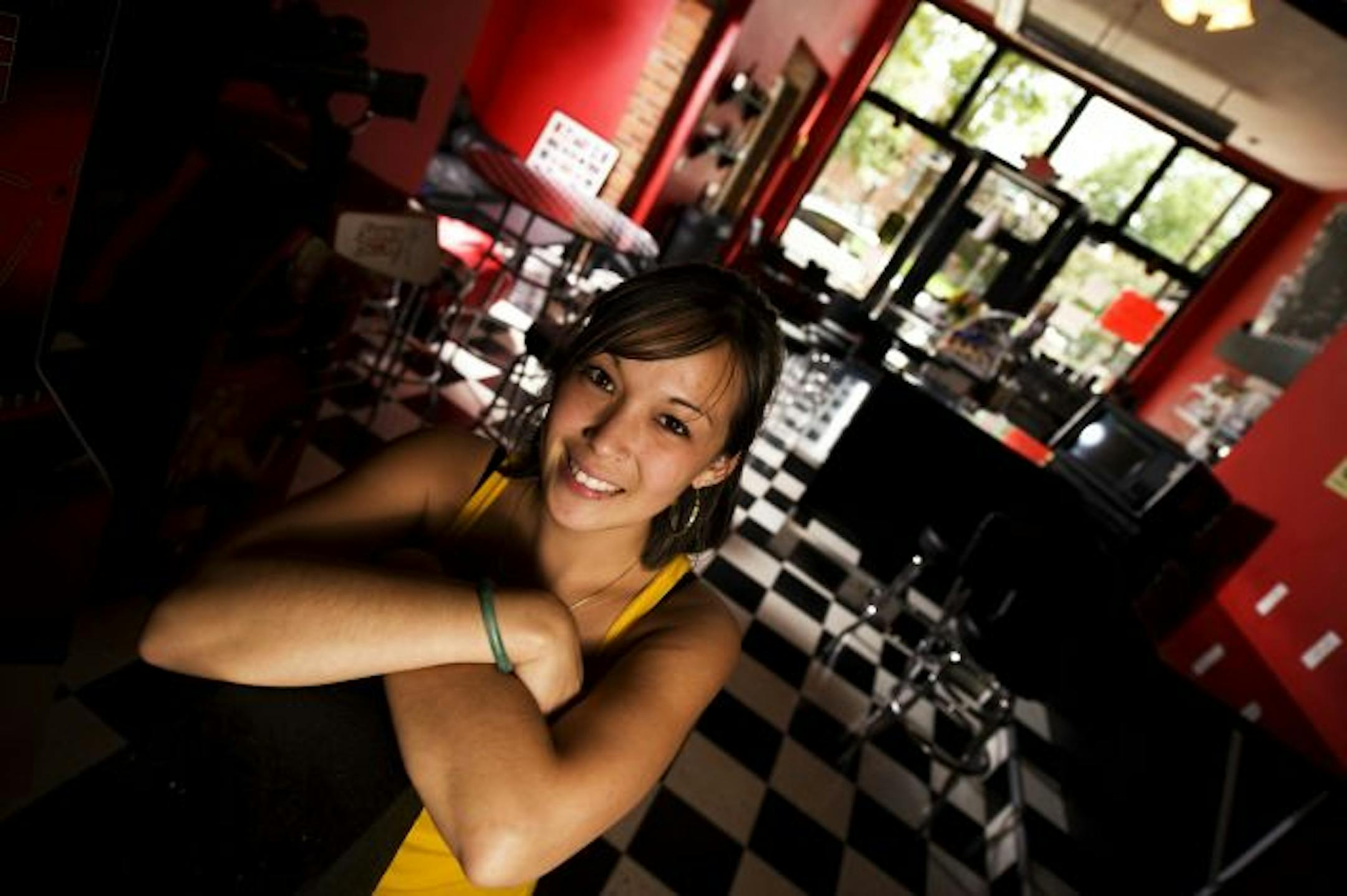 Rudies Coffeehouse on West 7th has reopened after an arson fire last January. Seen here is owner, Bridget Tran.