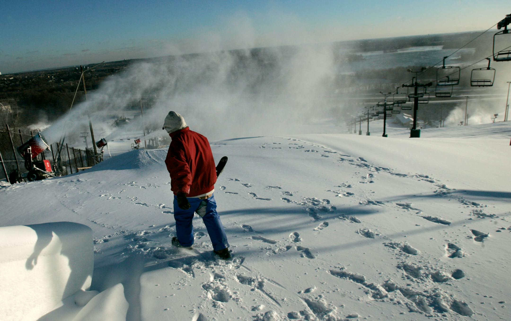 DAVID JOLES � djoles@startribune.comBurnsville, MN - Nov. 30, 2007 - Buck Hill ski resort worker Erin Krause does maintenance of snow making equipment on the top of the hill Friday. While much of the state is awaiting the arrival of the season's first significant snow fall, the snow making crew at Buck Hill has been working 24/7 to get the slopes ready for the ski season, creating a base that is already 6-24 inches deep. Doing that, is not easy, said Buck Hill general manager Don McClure, who h