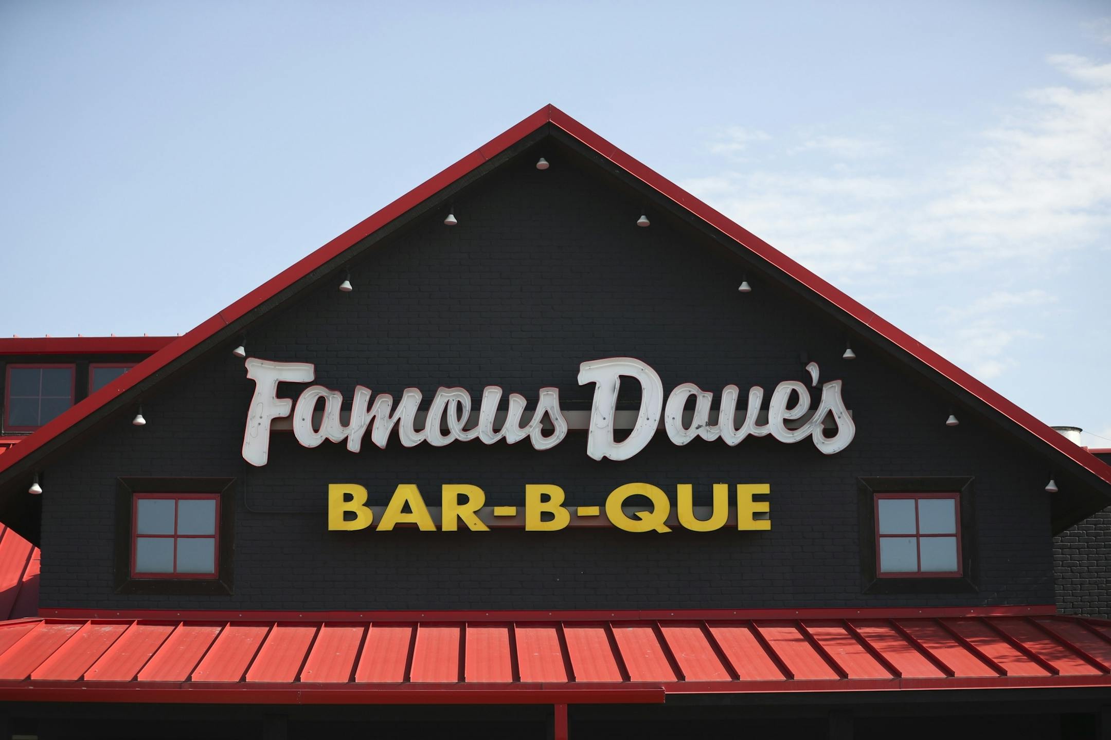 New signage and an updated grey and red color scheme at the Famous Dave's location in Maple Grove.