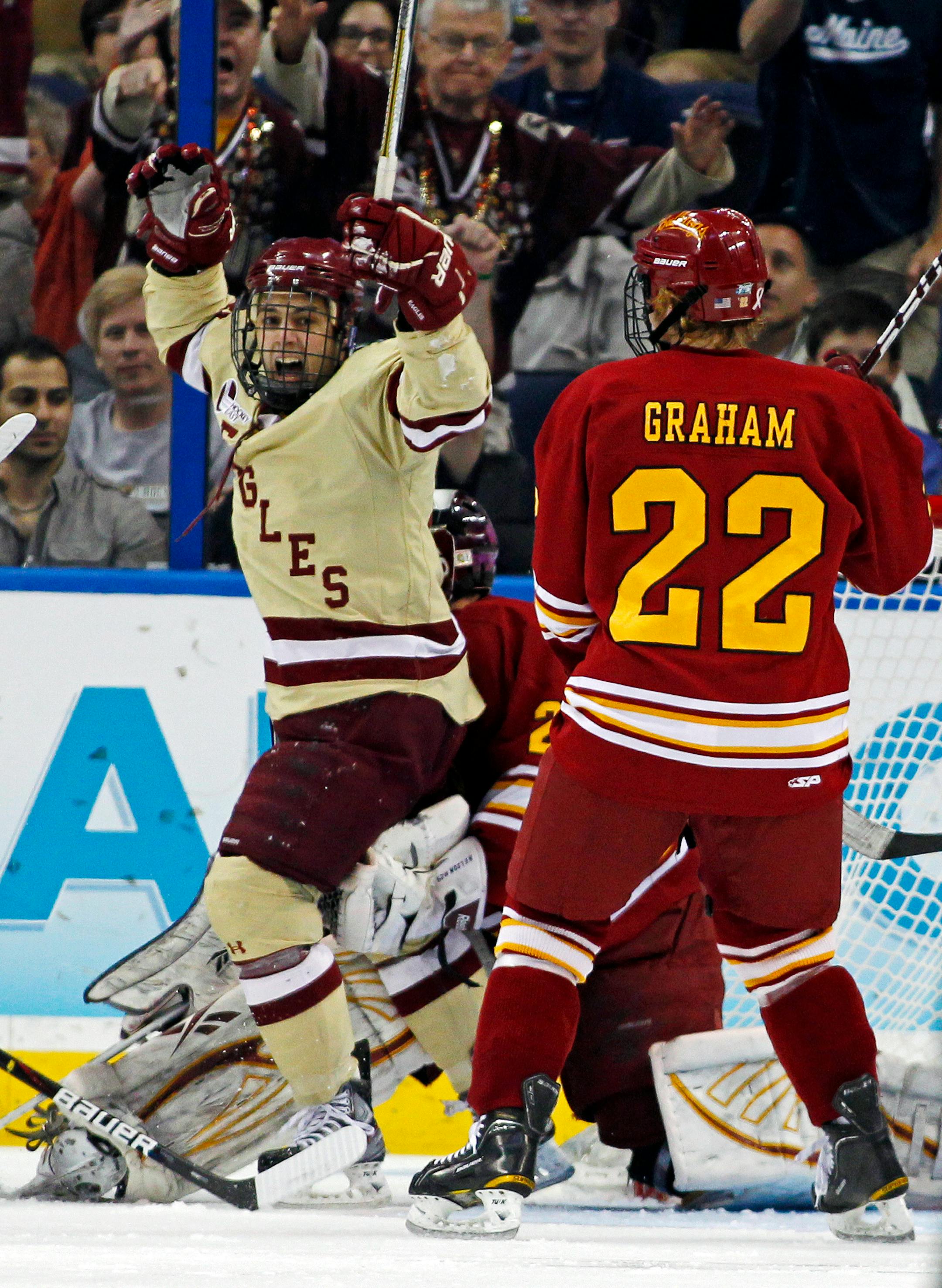 Boston College's Steven Whitney celebrated after scoring a goal in the first period Saturday as Ferris State goalie Taylor Nelson and Derek Graham looked on.