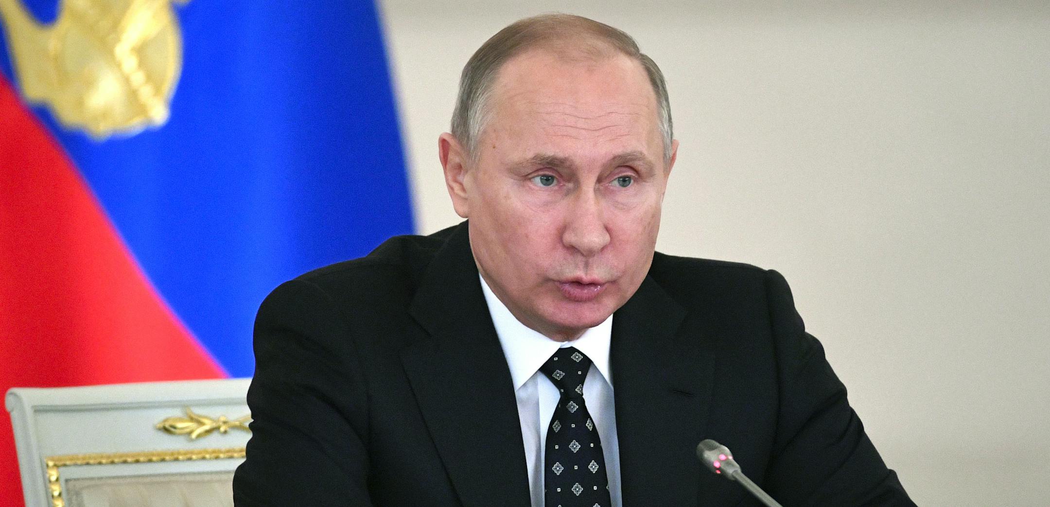 Russian President Vladimir Putin chairs a meeting of the State Council in the Kremlin, in Moscow, Russia, Wednesday, Dec. 27, 2017. (Alexander Nemenov/Pool Photo via AP)